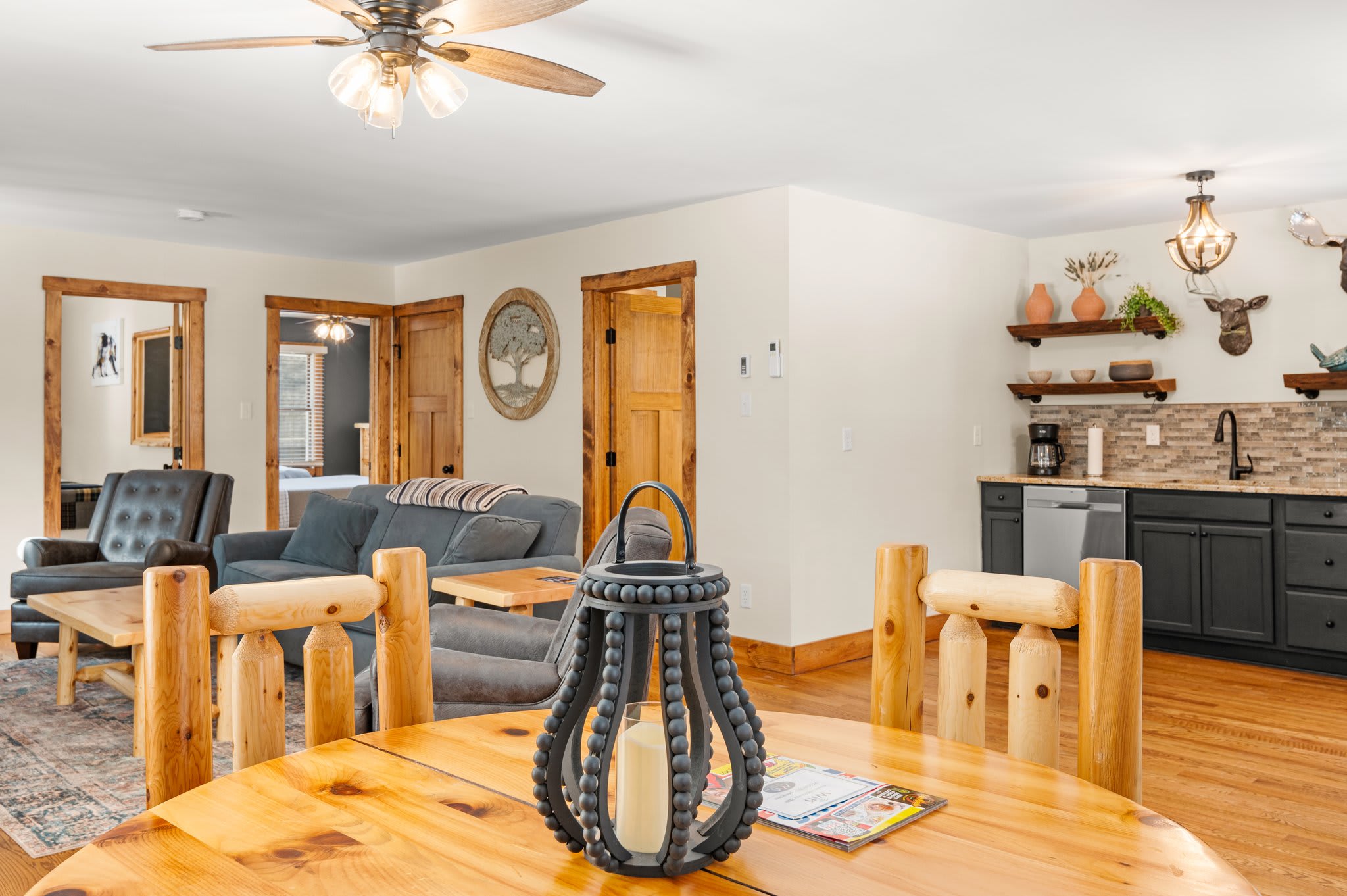 Open and Inviting Space
From dining to lounging, this space keeps everyone connected and comfortable in rustic style.