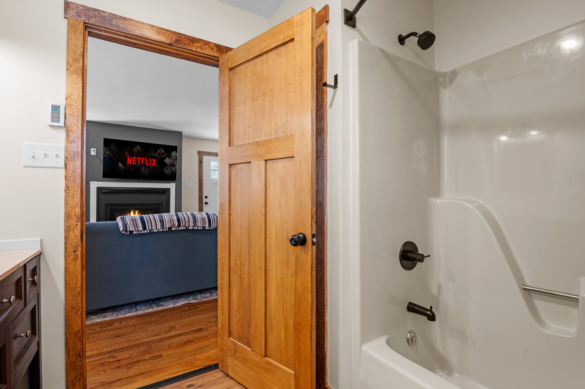 Clean and Simple Shower Combo
A convenient shower-tub setup gives you options to refresh and relax after a day of exploring.