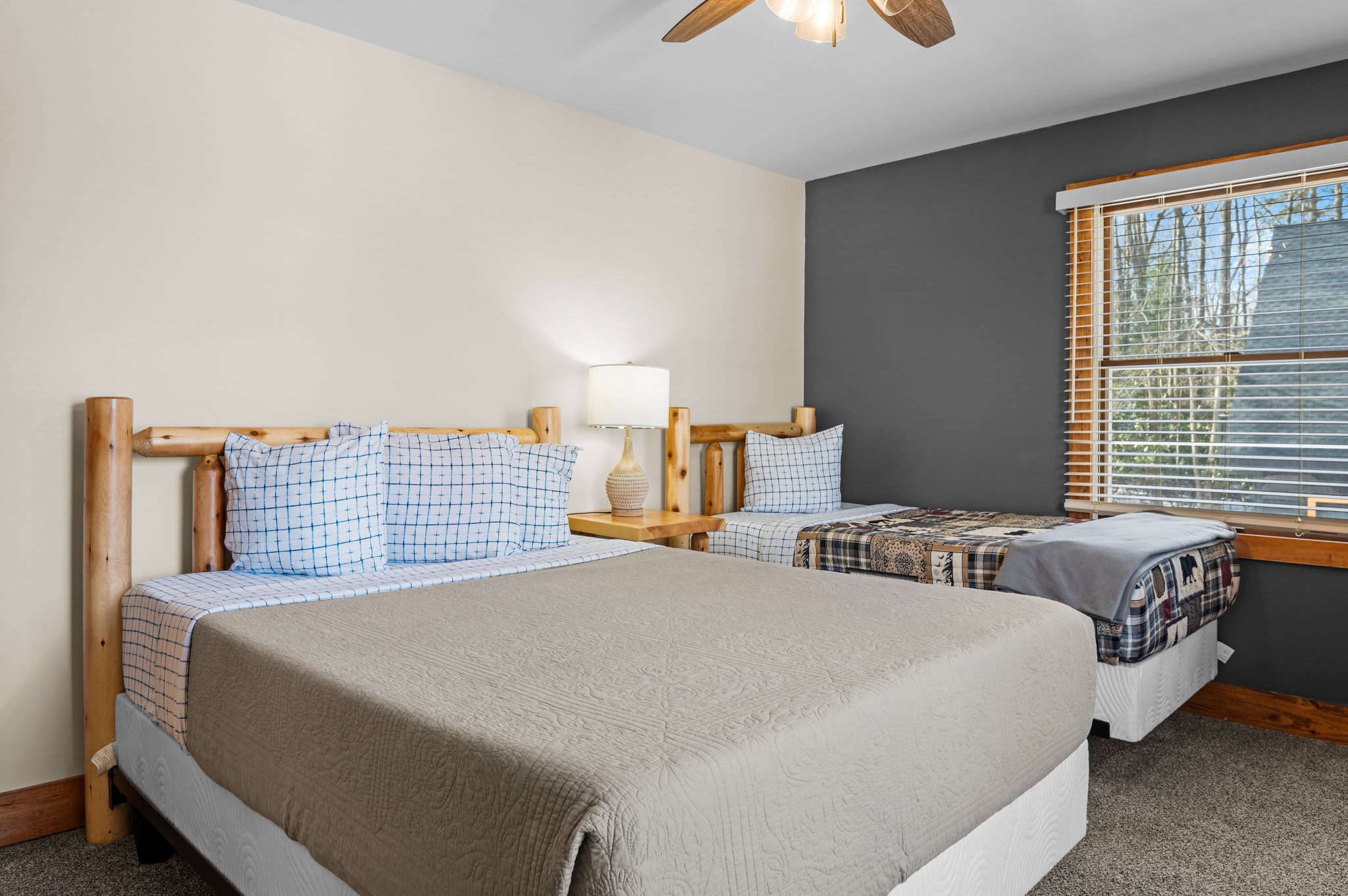 Double the Comfort
This spacious bedroom features two comfy beds, perfect for families or groups needing flexible sleep setups.
