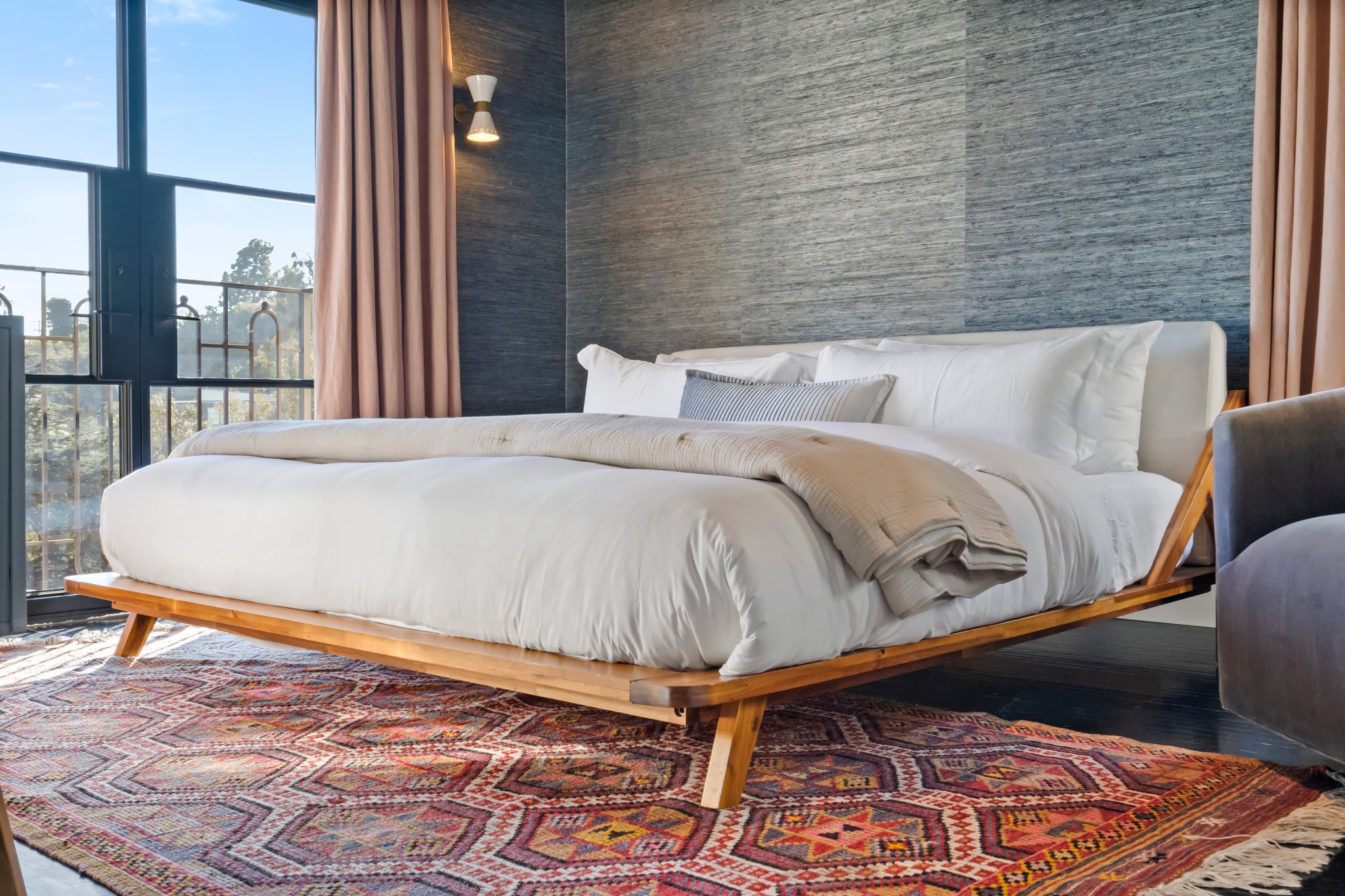 Crisp linens, organic textures, and thoughtful amenities throughout.