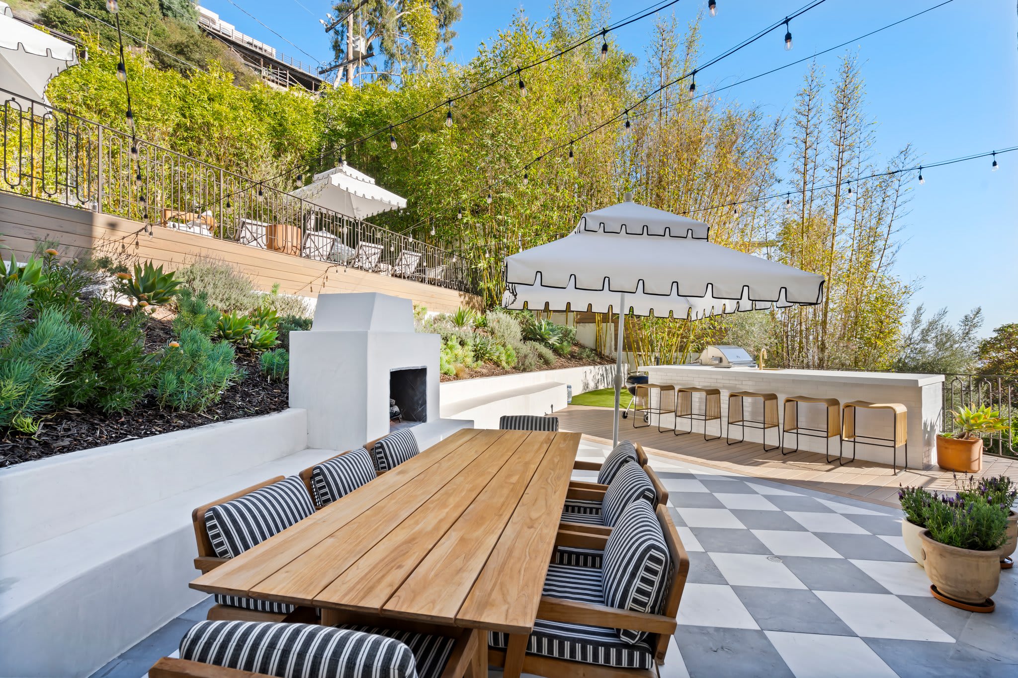 Al fresco dining made effortless with a built-in BBQ and spacious bar.
