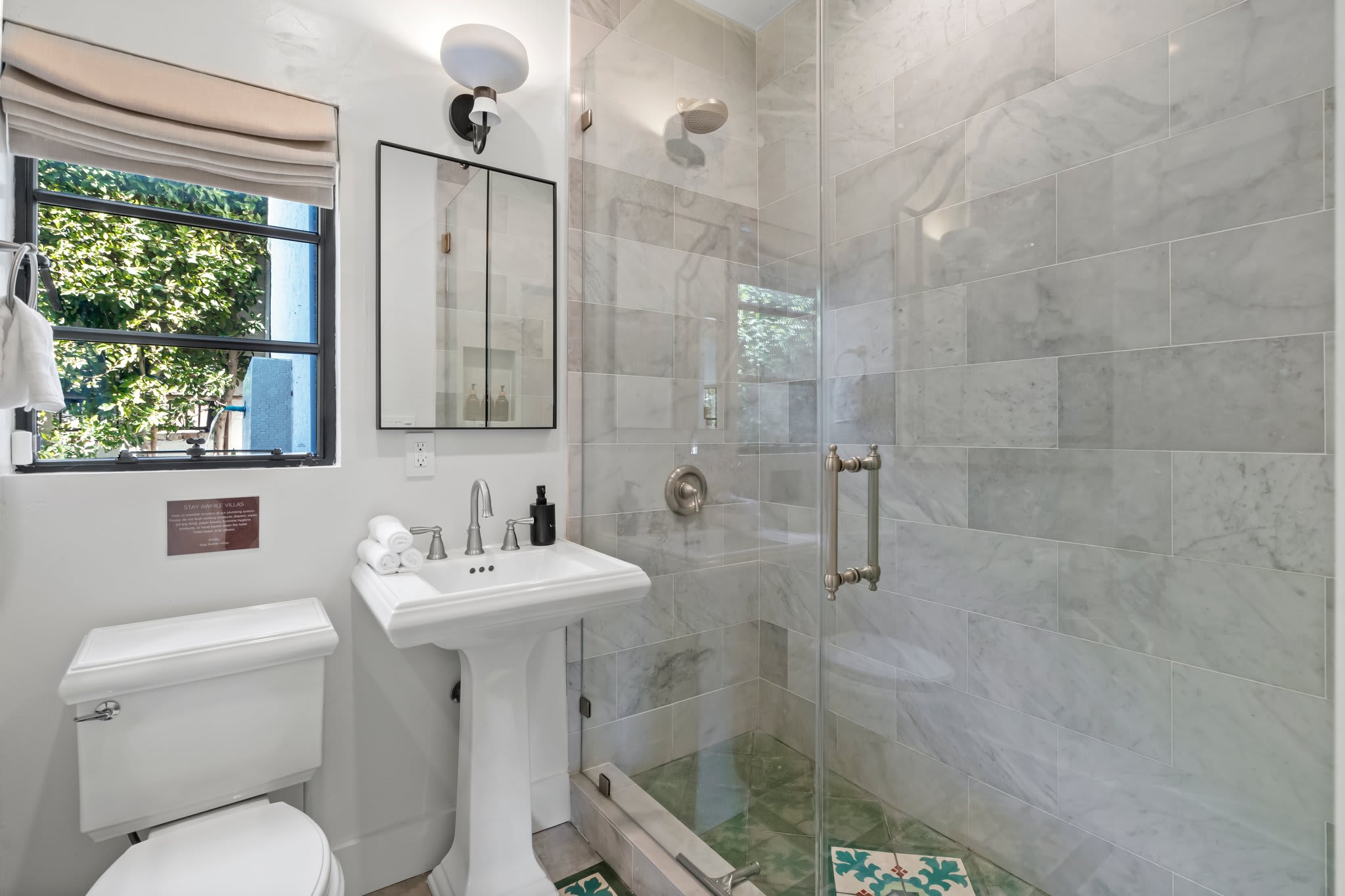 Step into a spa-like shower stocked with premium toiletries and plush towels.