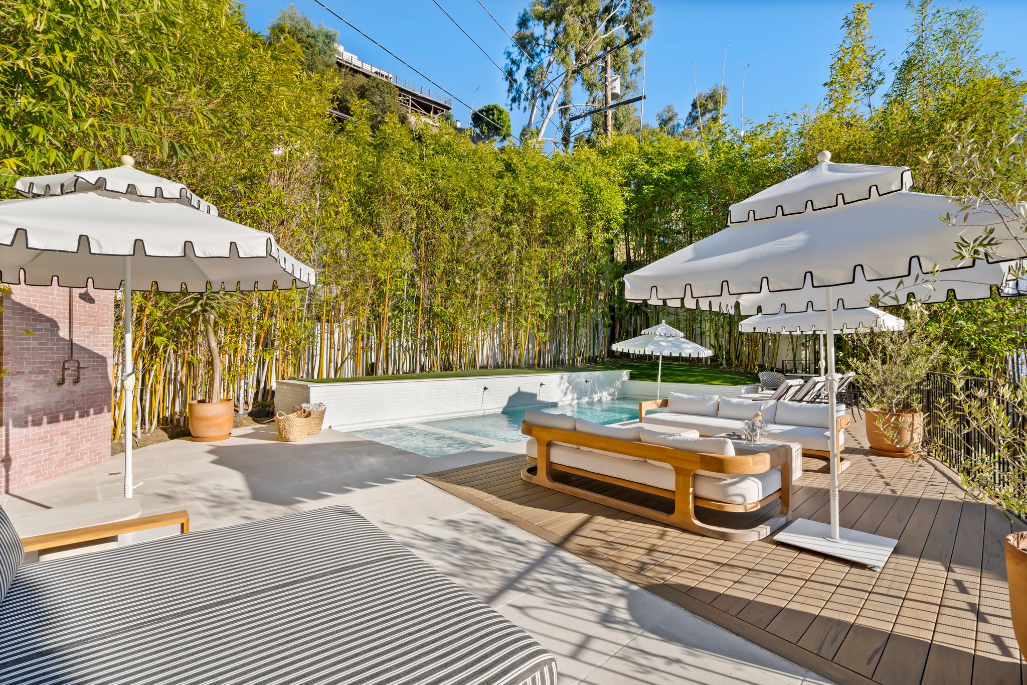 Bask in the sun or cool off in the pool—this outdoor space has it all.