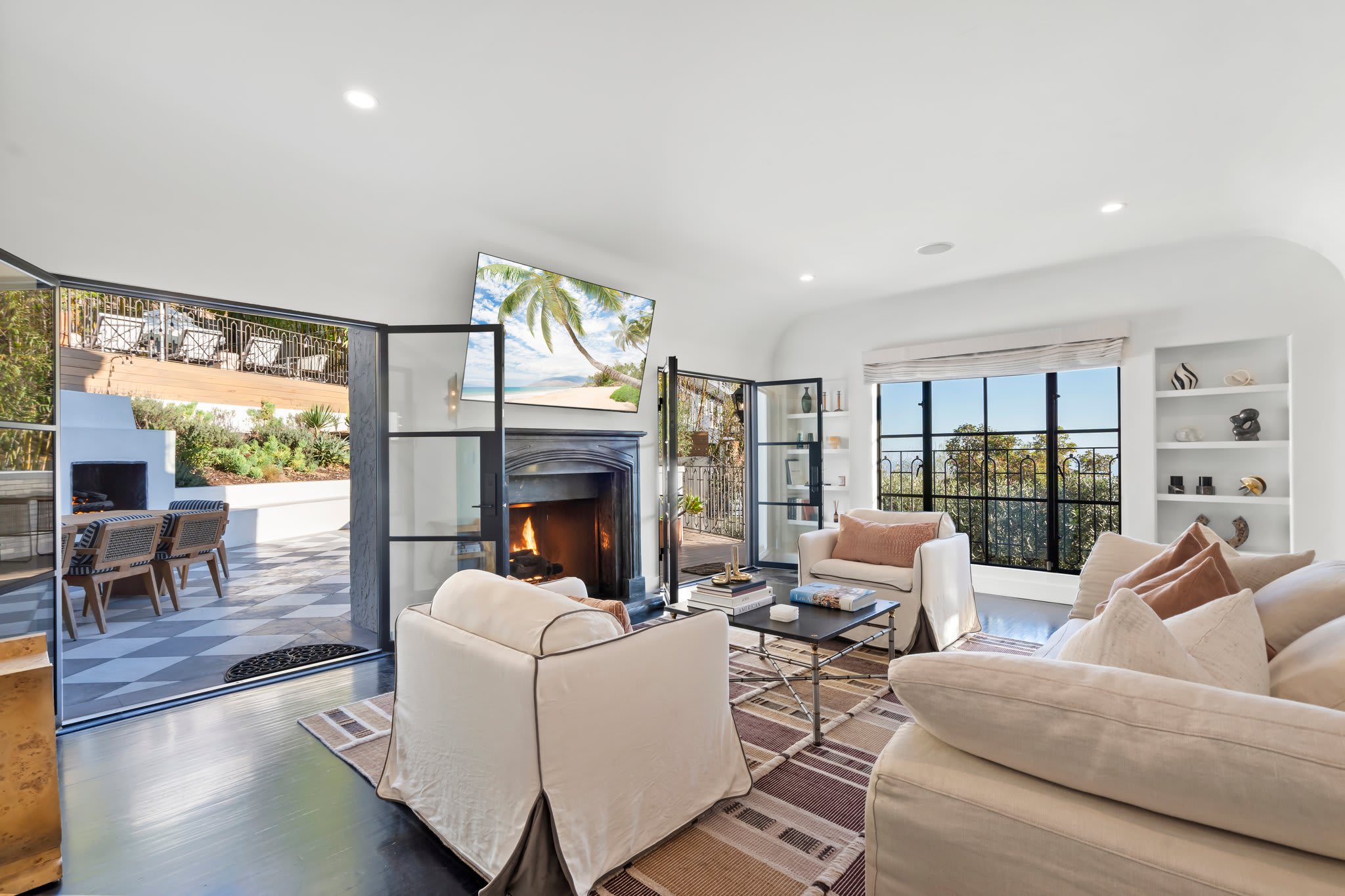 Relax by the fireplace and sink into the plush, designer seating.