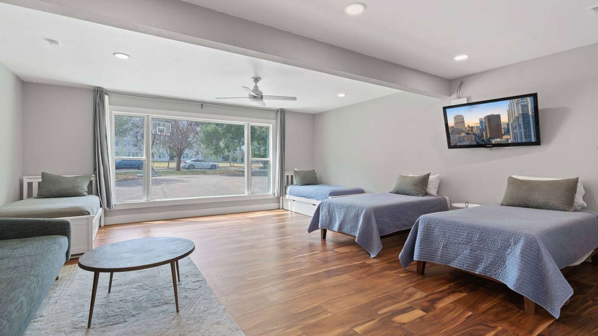 5 Twin beds (3 with pull-out trundles — total of 8 Twin beds) | Sleeps 8 | Ensuite bathroom with toilet and shower (hairdryer provided)