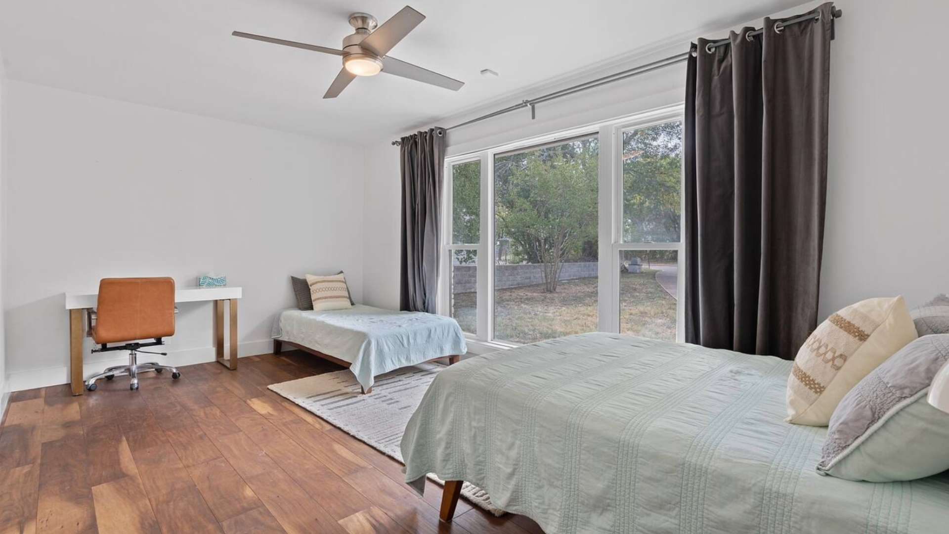 Bedroom with 3 with 1 Twin bed and 1 Full bed 