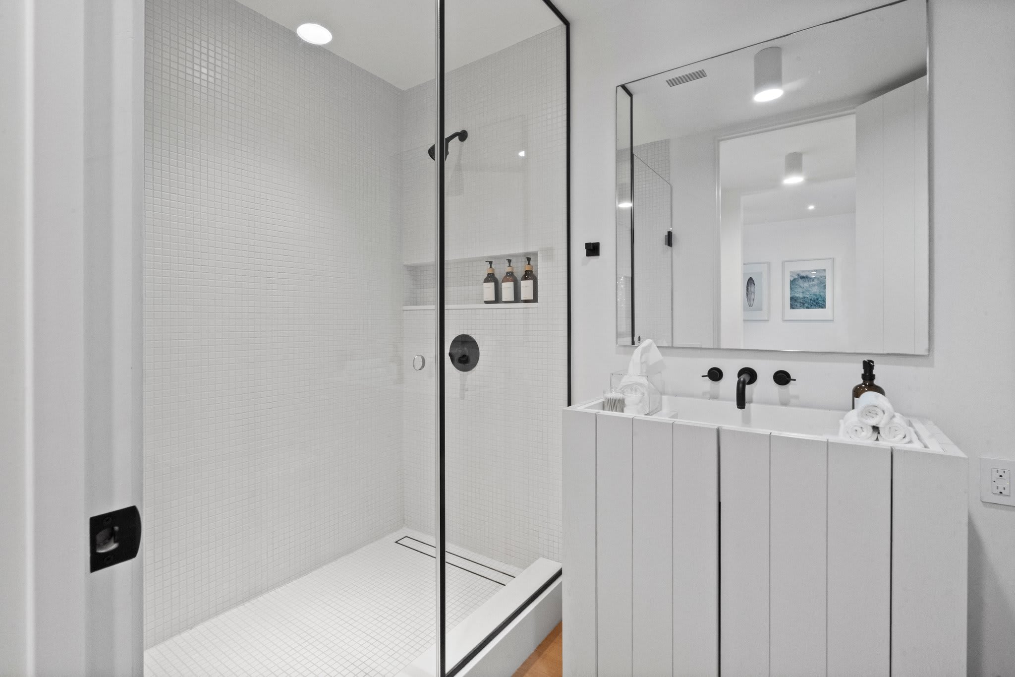 Designed for ease, with plush towels, custom vanities, and refined finishes.