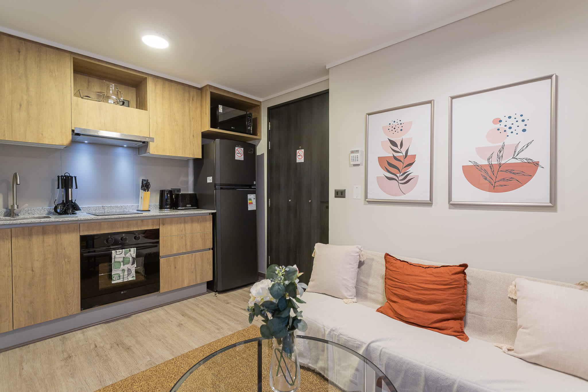 Chic and cozy studio with a modern kitchen and stylish living area, perfect for a relaxing stay in the heart of Chile.