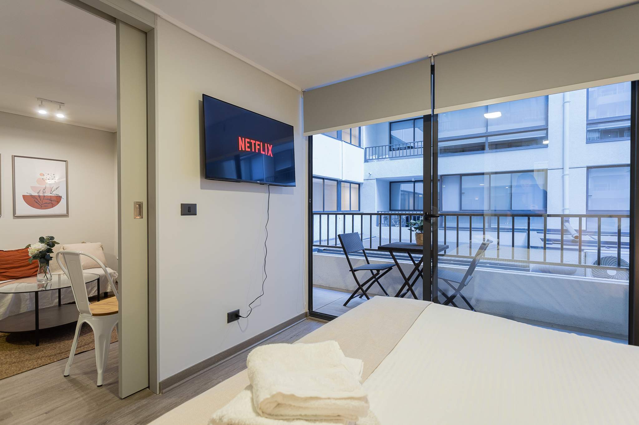 Relax in this cozy studio with Netflix and a private balcony, perfect for unwinding after exploring the city.
