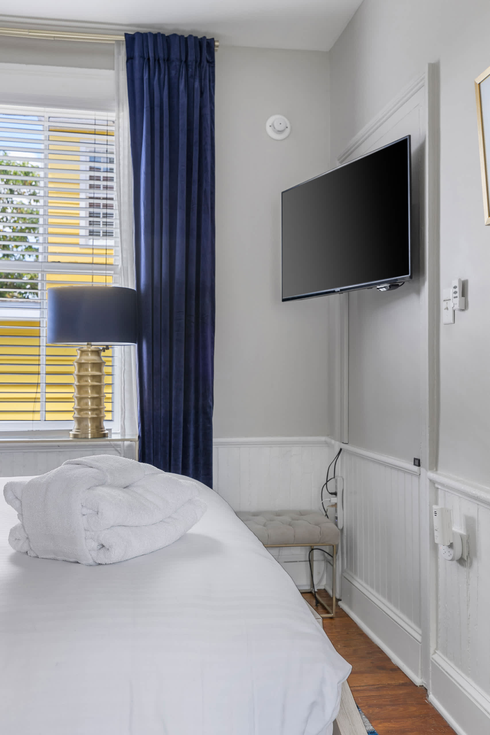 Bedroom #1: Queen Bed + Ceiling Fan + TV