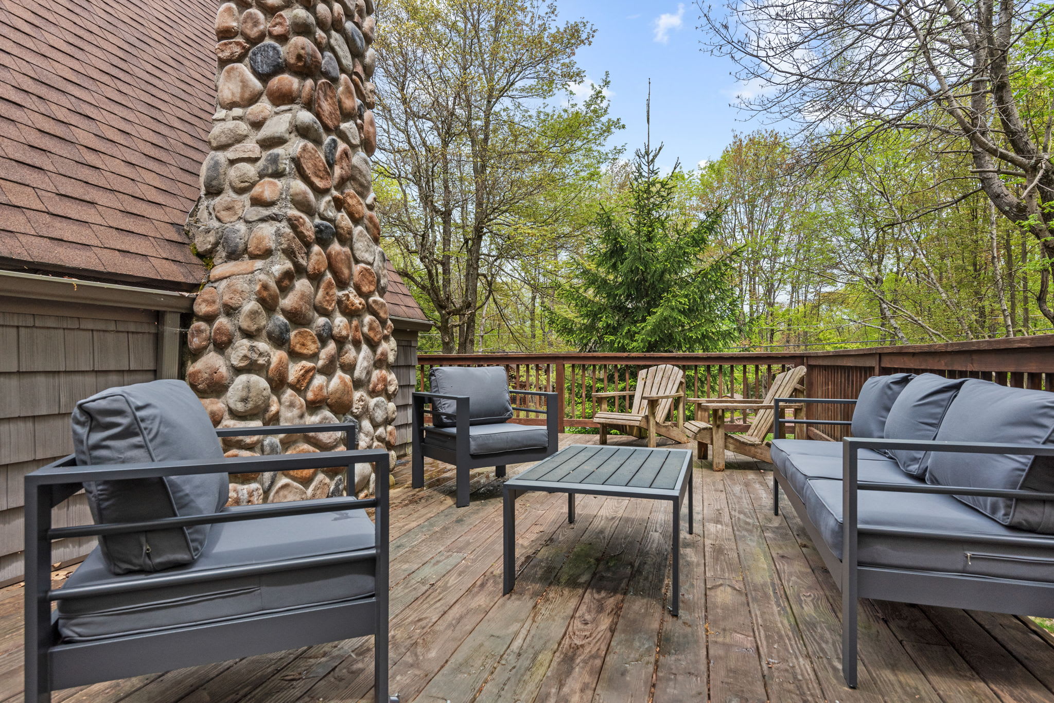 Check-out our outdoor seating area on our deck while soaking in the panaromic views of greenery 
