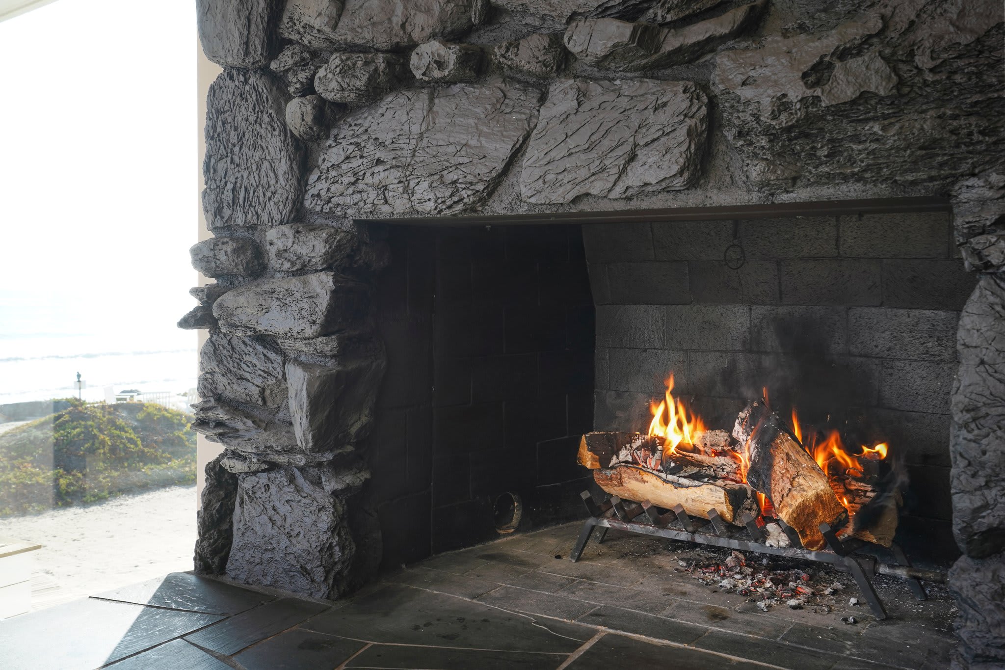 Settle in by the fire and let the crackling warmth complete your evening.
