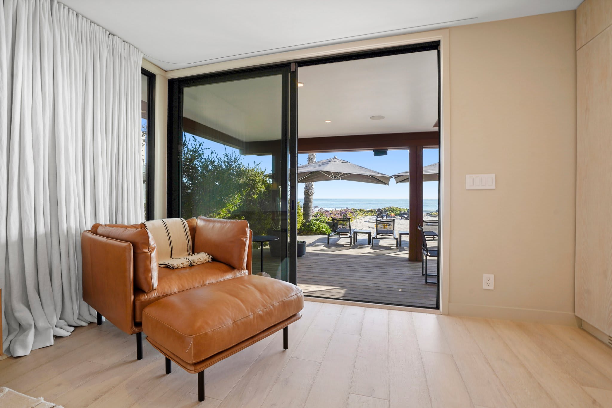 Unwind in style with the ocean just steps away.