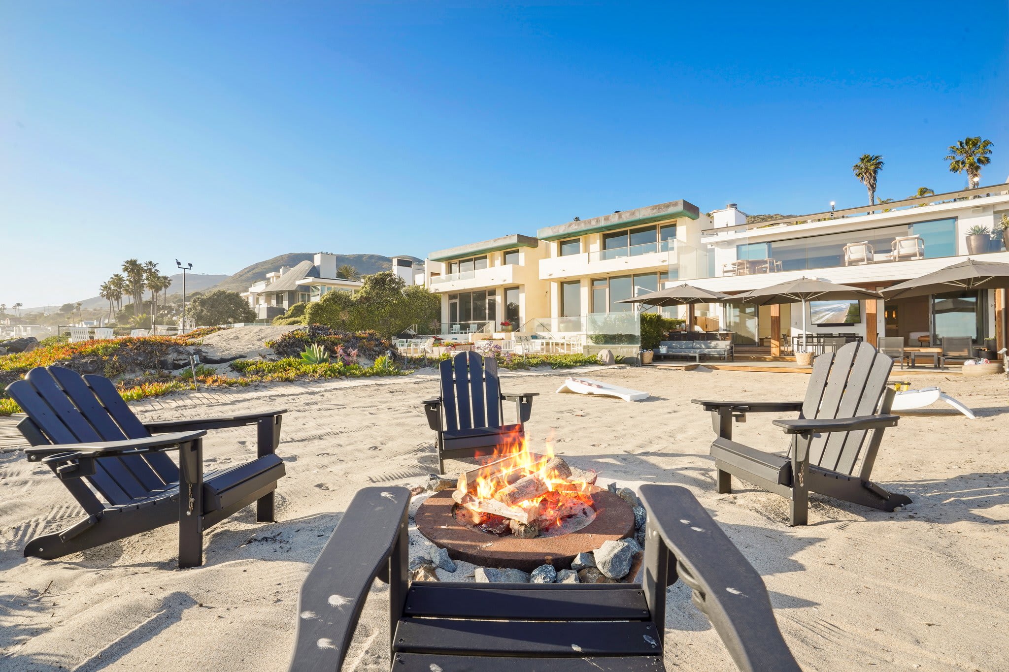 End your day fireside, just steps from the ocean.