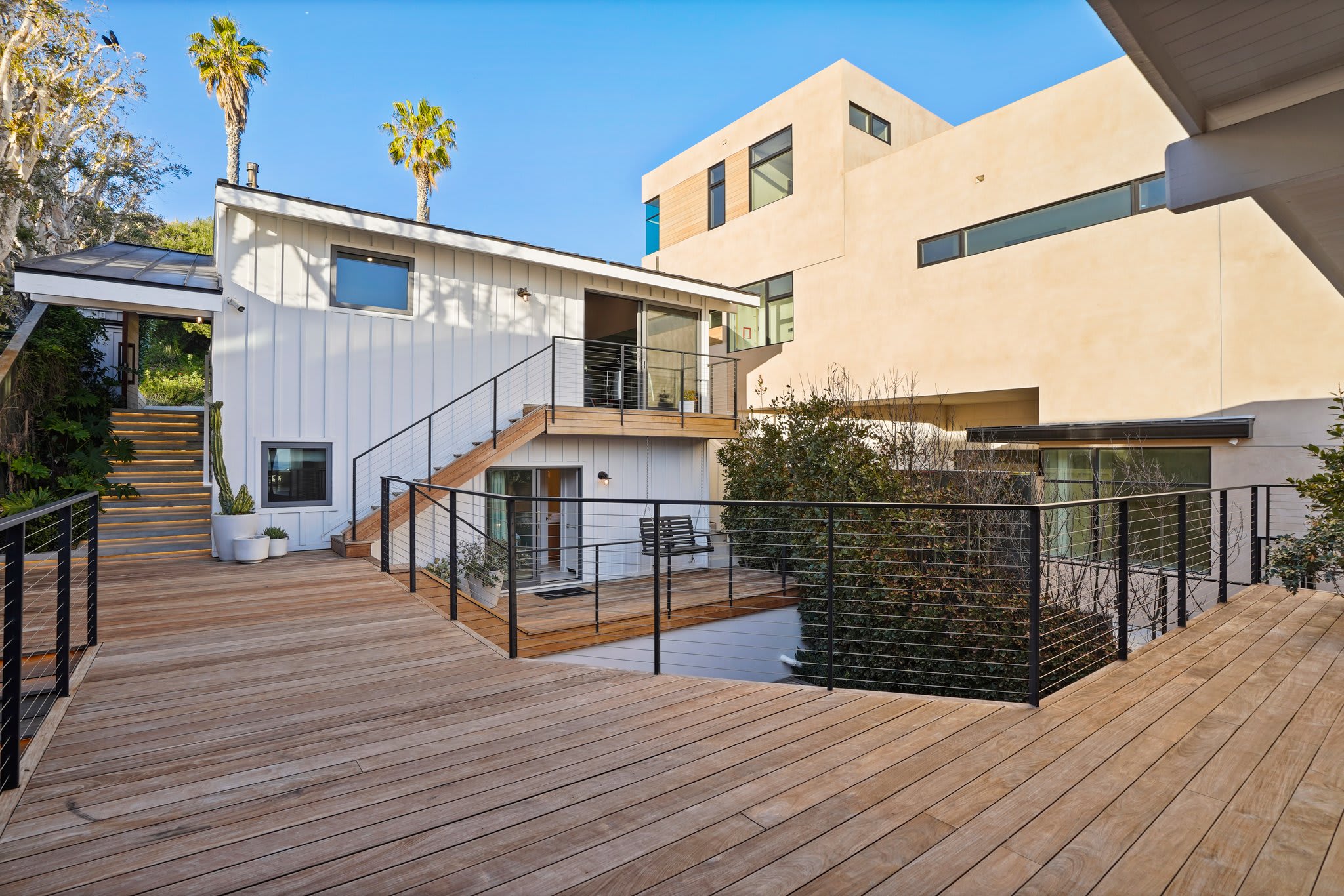 A warm welcome awaits with coastal charm and seamless indoor-outdoor flow.