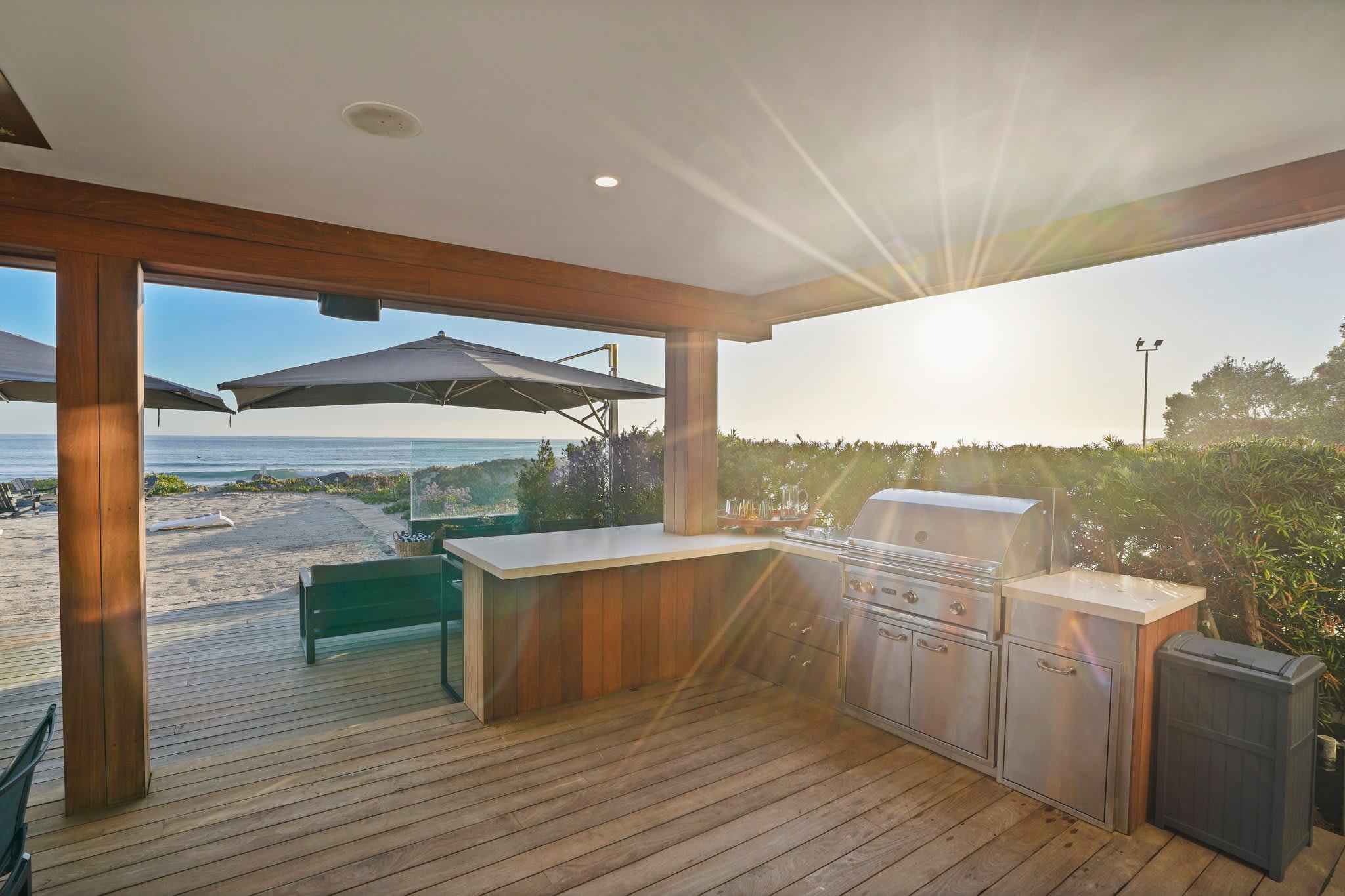 A fully equipped outdoor kitchen, ready for seaside barbecues and sunset feasts.