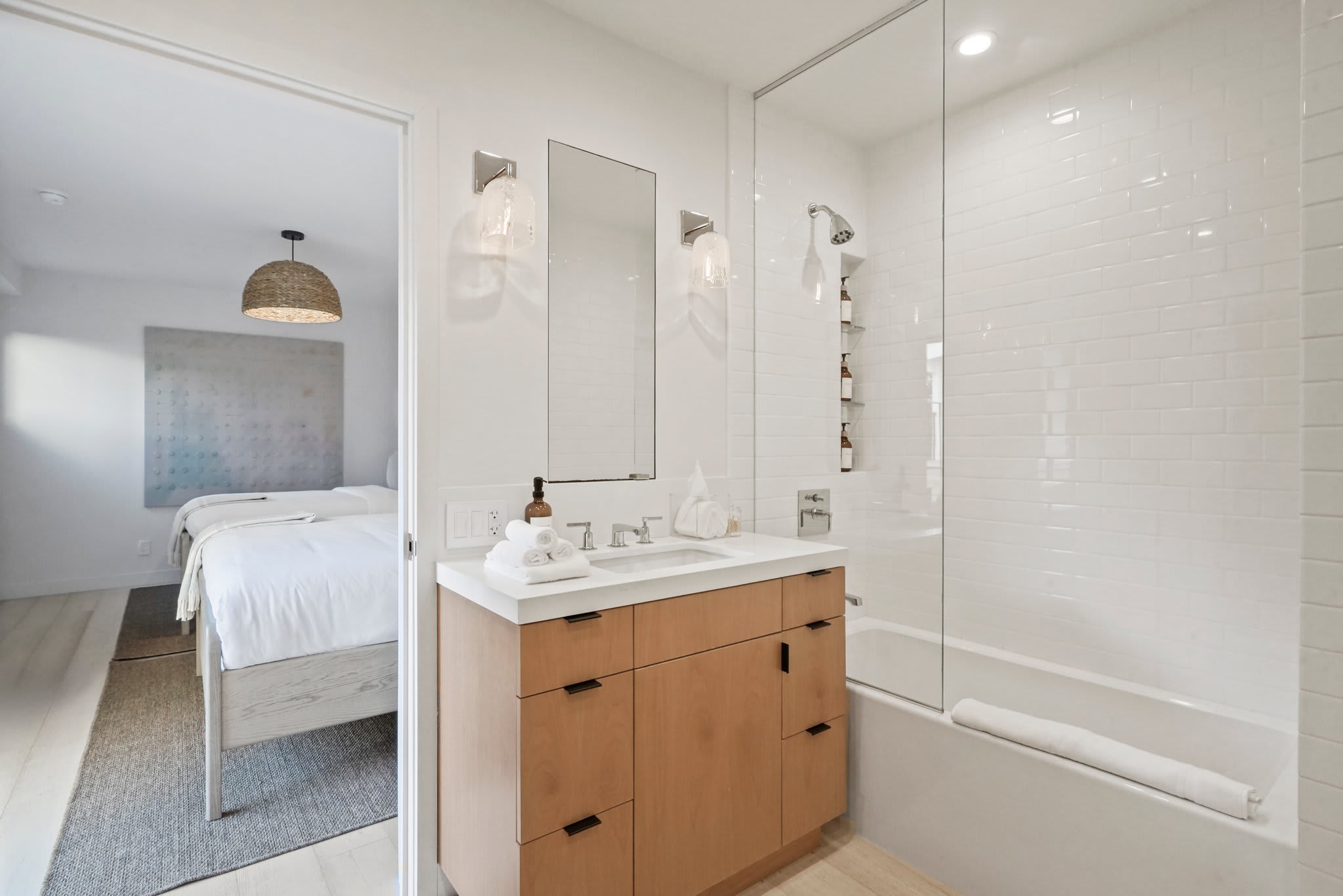 Modern design, premium bath essentials, and warm accents.
