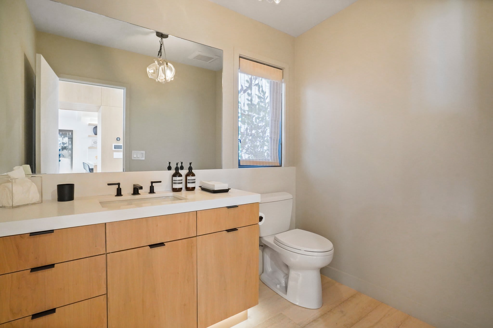Refresh in a sleek en suite stocked with premium essentials.
