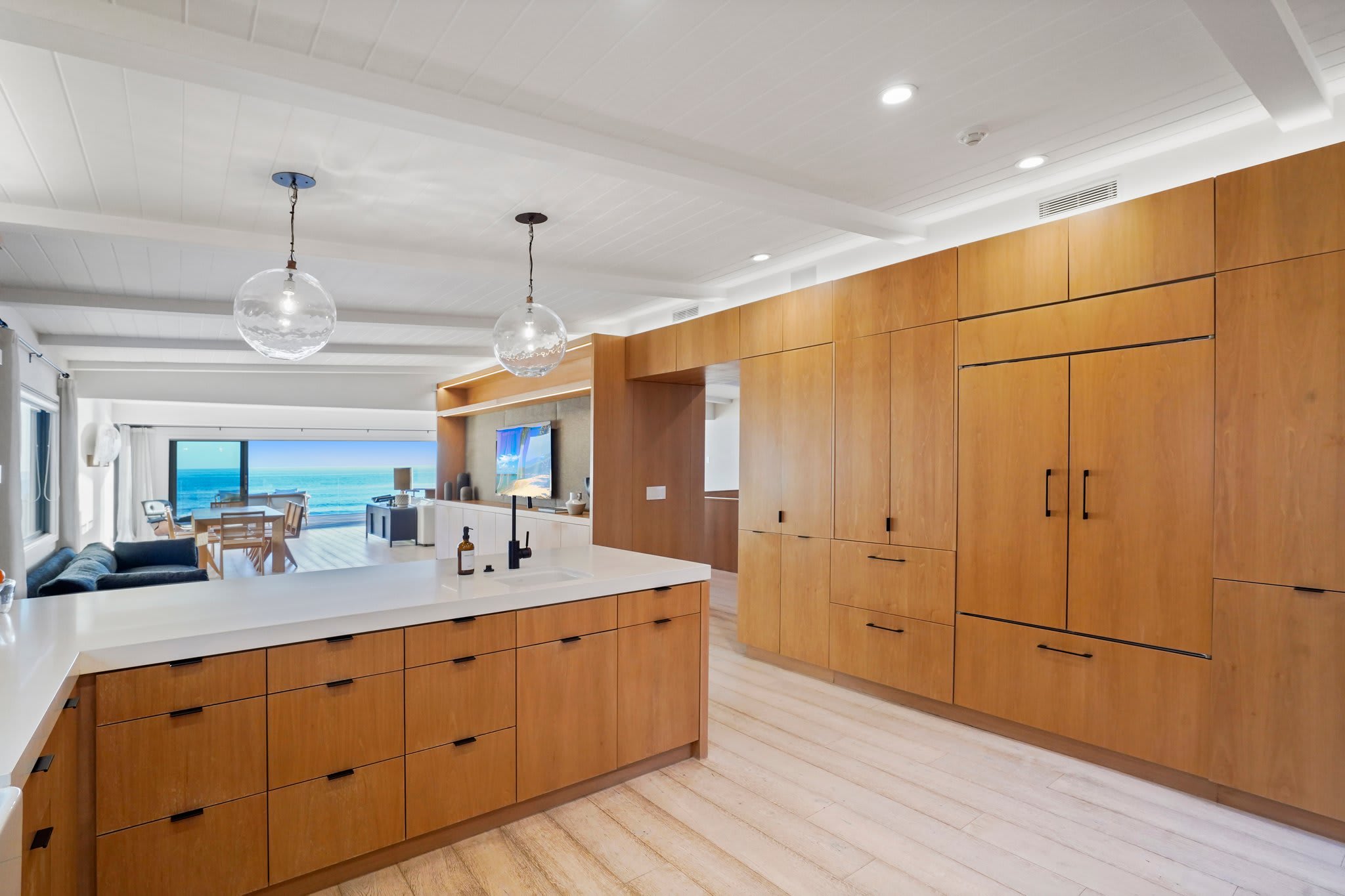 Prepare meals with ocean views and seamless indoor-outdoor flow.