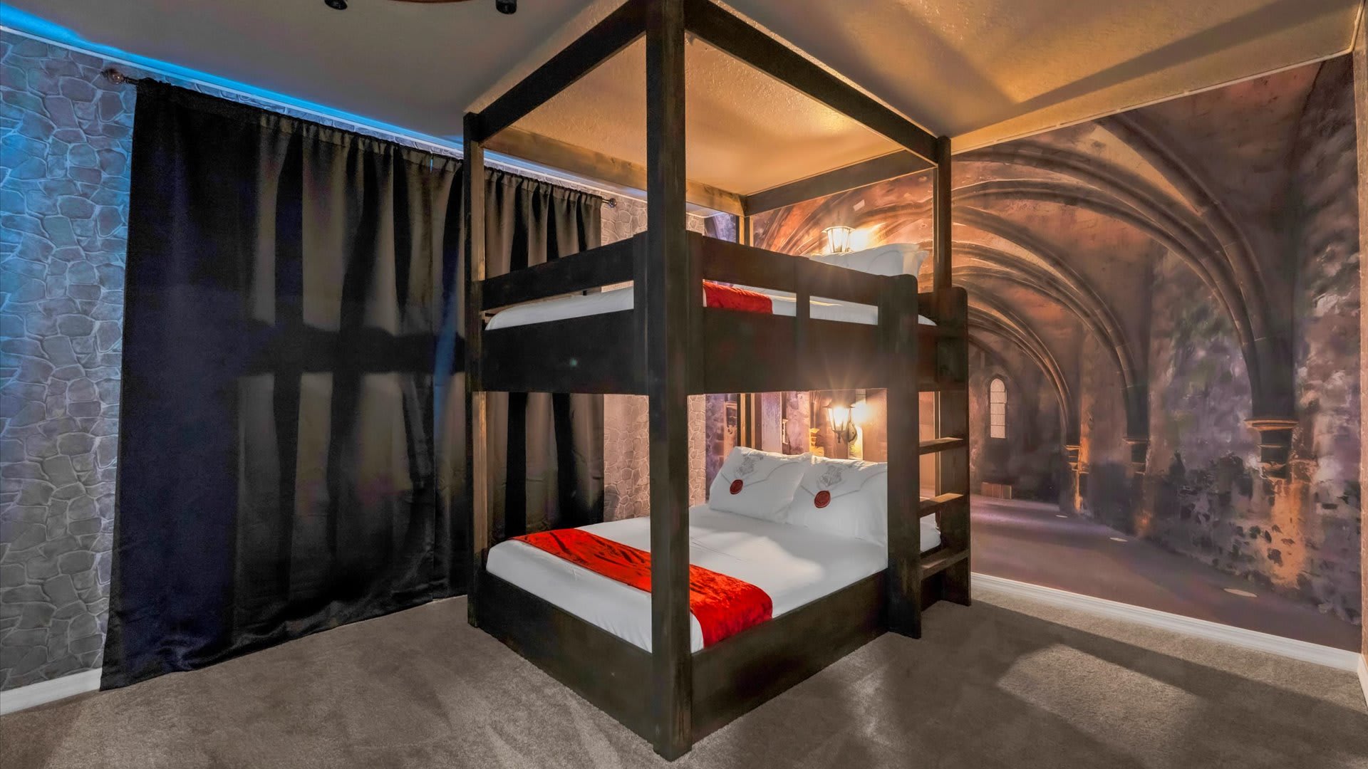 Hogwarts themed bunk bedroom with full beds