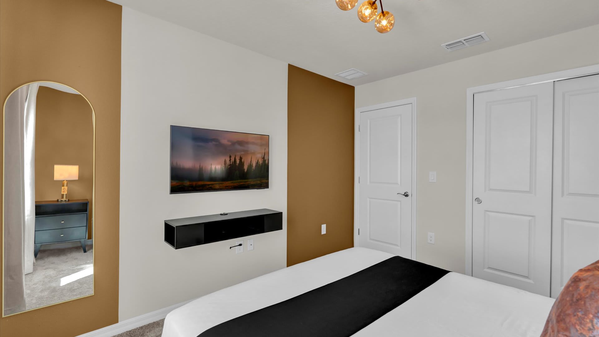 Second queen bedroom with smart TV