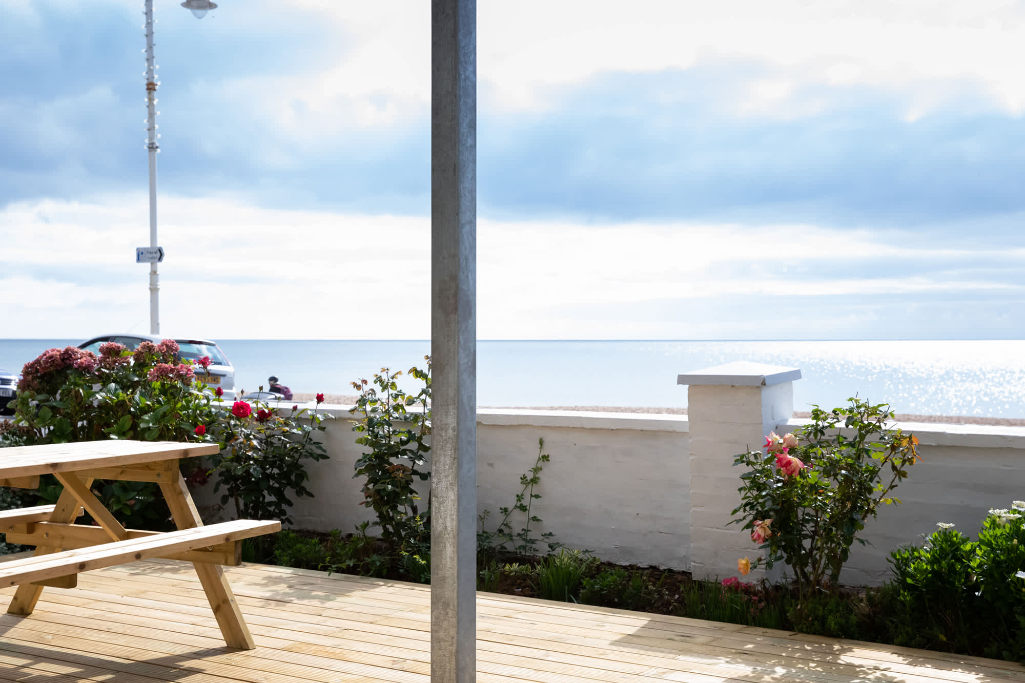 Absolute Beachfront with Decked Garden Oasis and Views