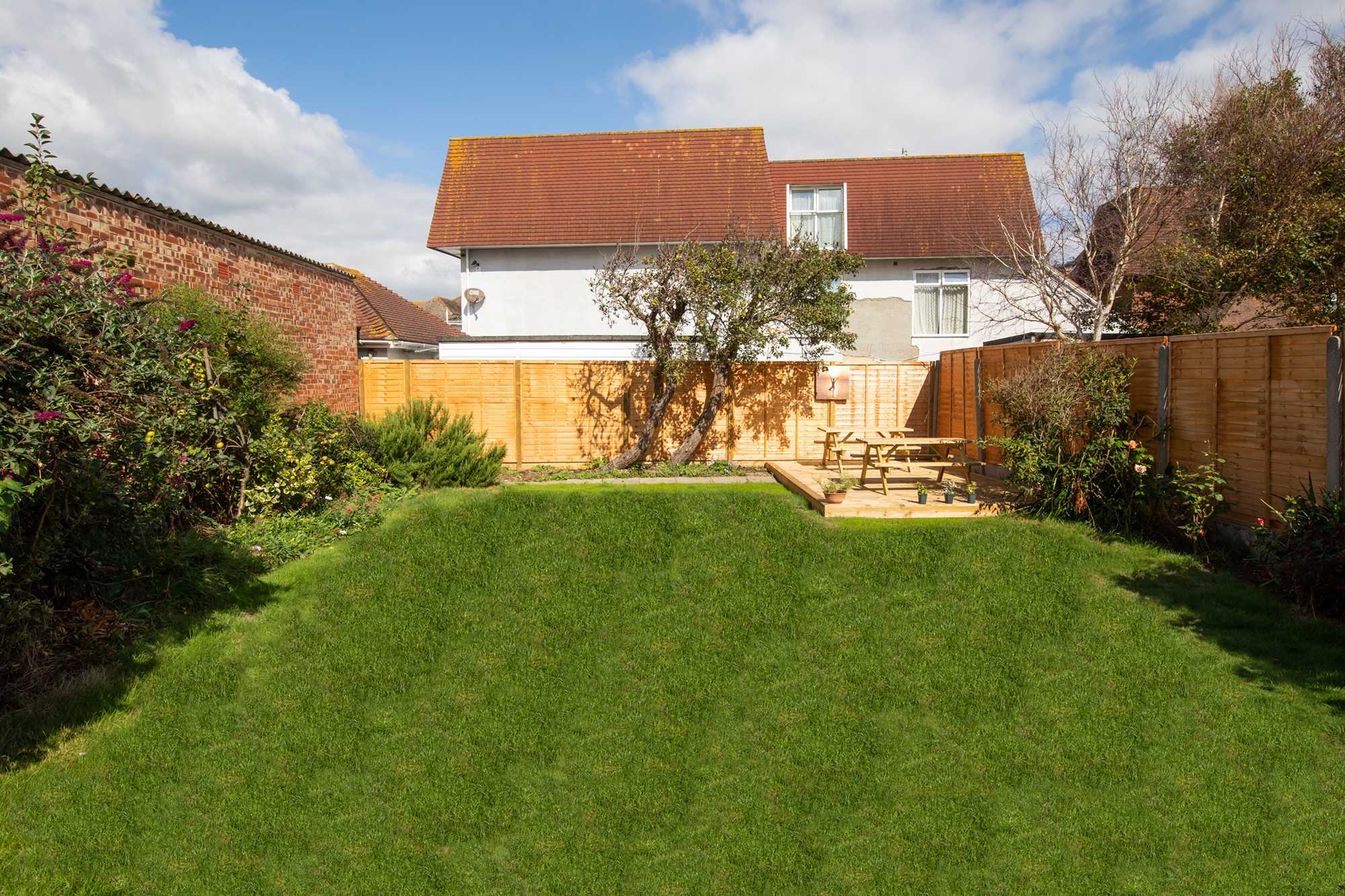 Let the kids run around the enclosed garden with plenty of space to burn off all that energy