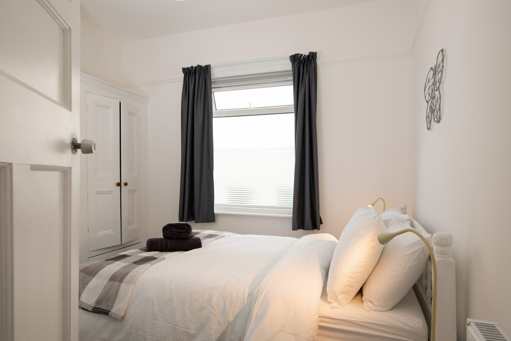 The stylish monochrome double bedroom