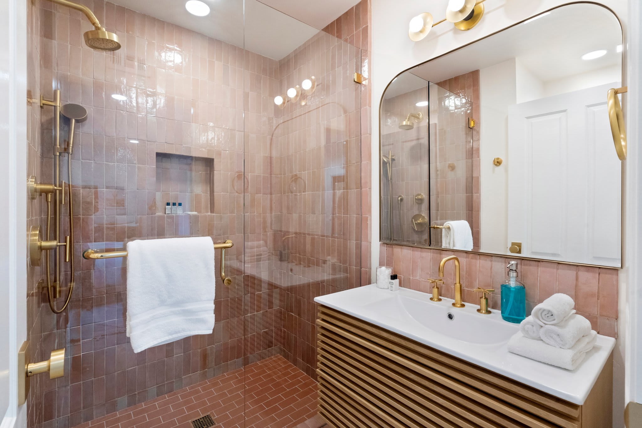 Modern elegance meets vintage charm in this luxe en-suite.