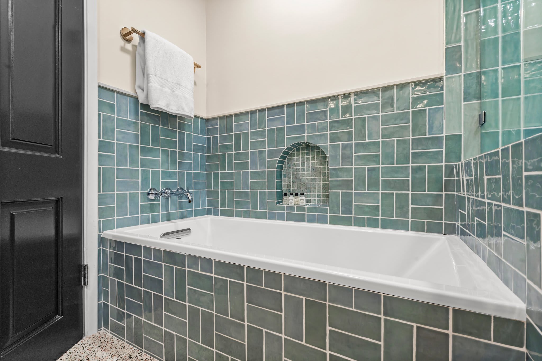 Lose yourself in layers of handcrafted tile and spa-like serenity.
