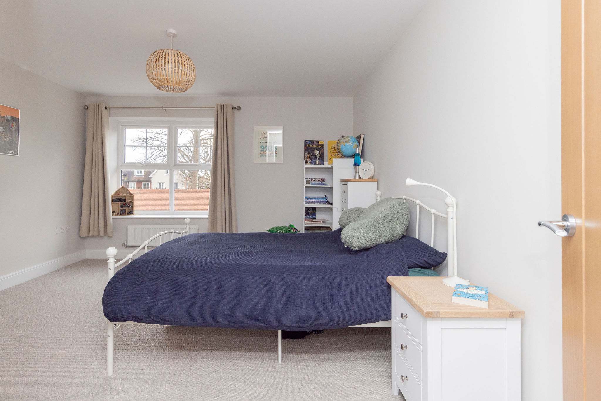 A double bedroom with quality linen and cushions for a good nights rest.