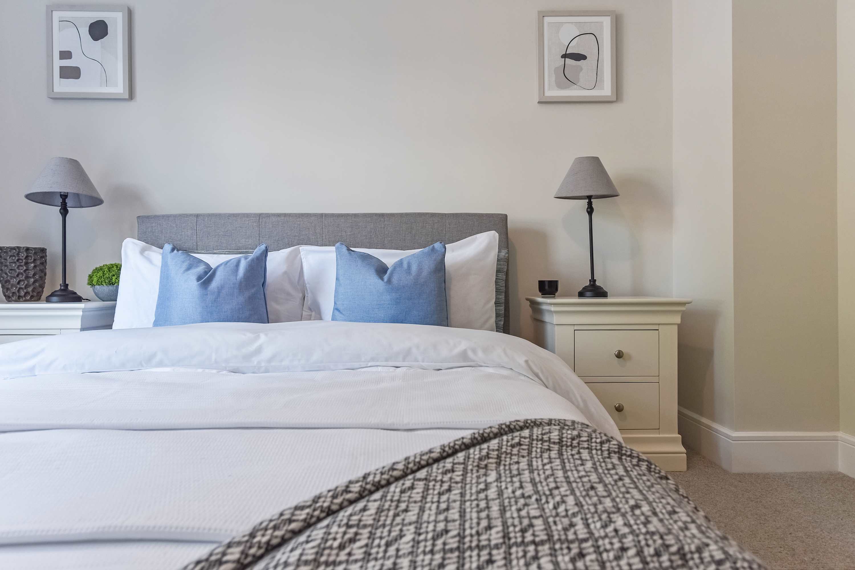 Each bedroom has bedside tables and reading lamps for your comfort.