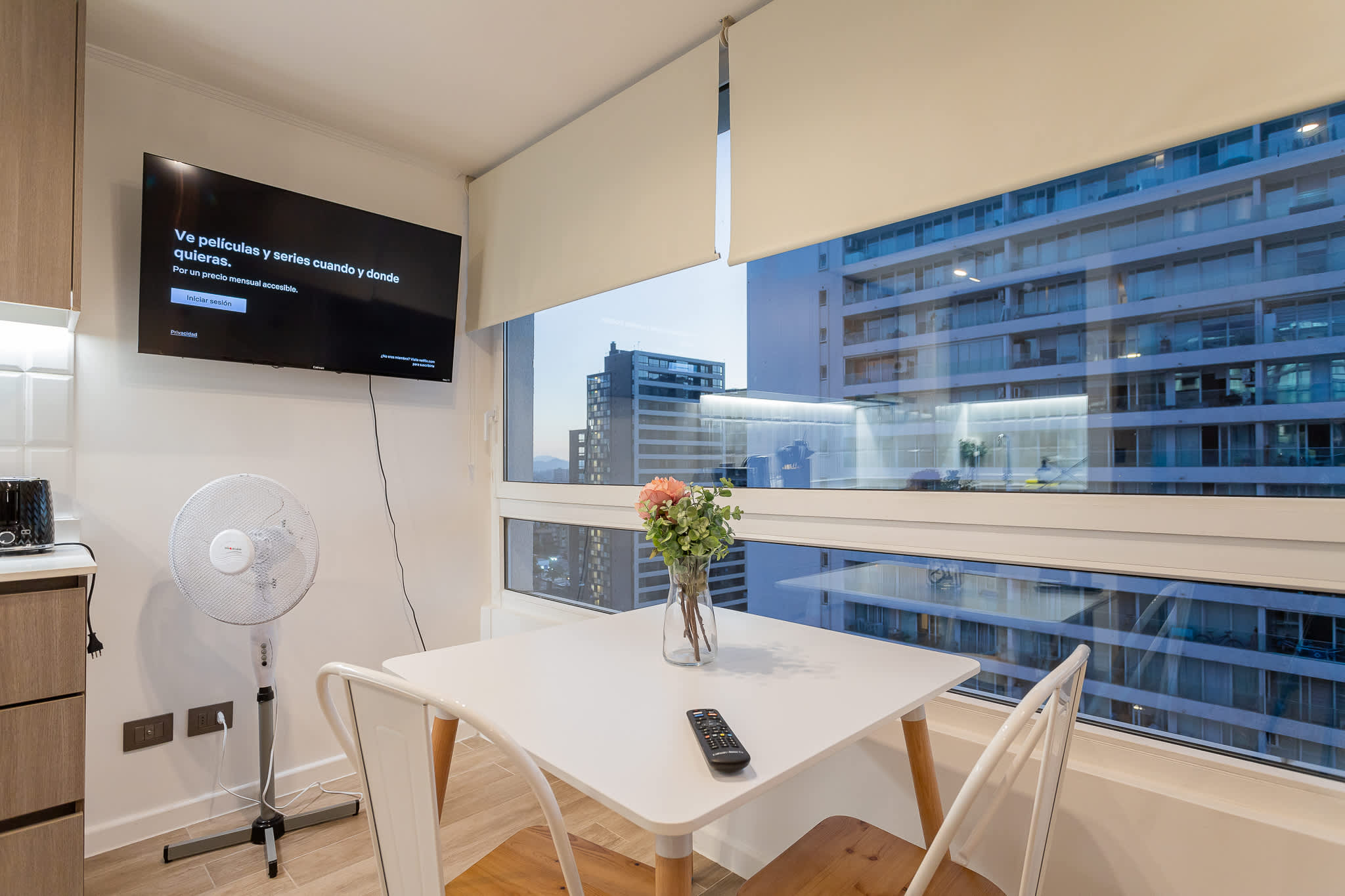 Enjoy city views from the cozy dining nook, perfect for intimate meals and relaxation in the heart of the city.