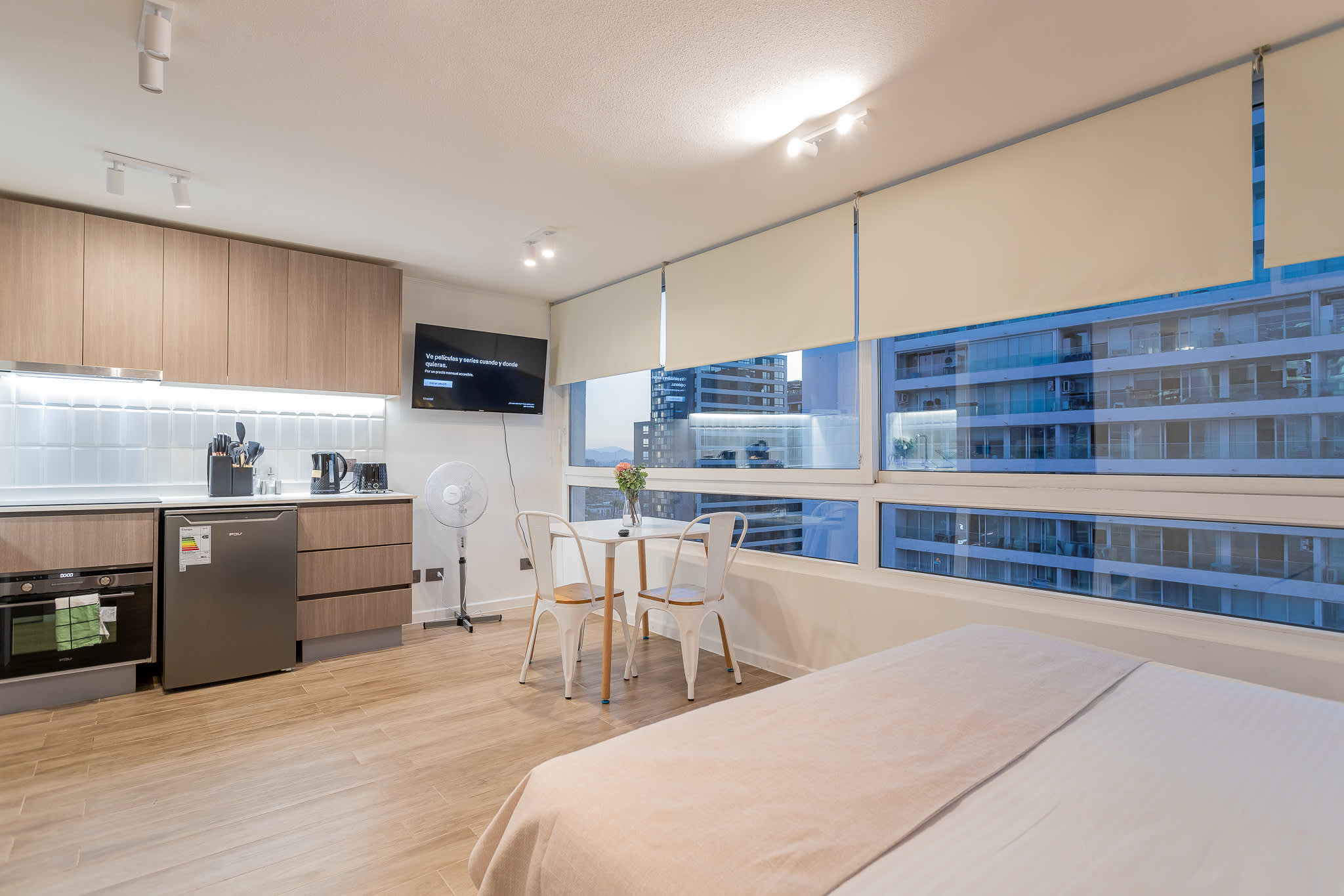 Chic studio with modern kitchen and stunning city views, perfect for a cozy stay in the heart of Chile.