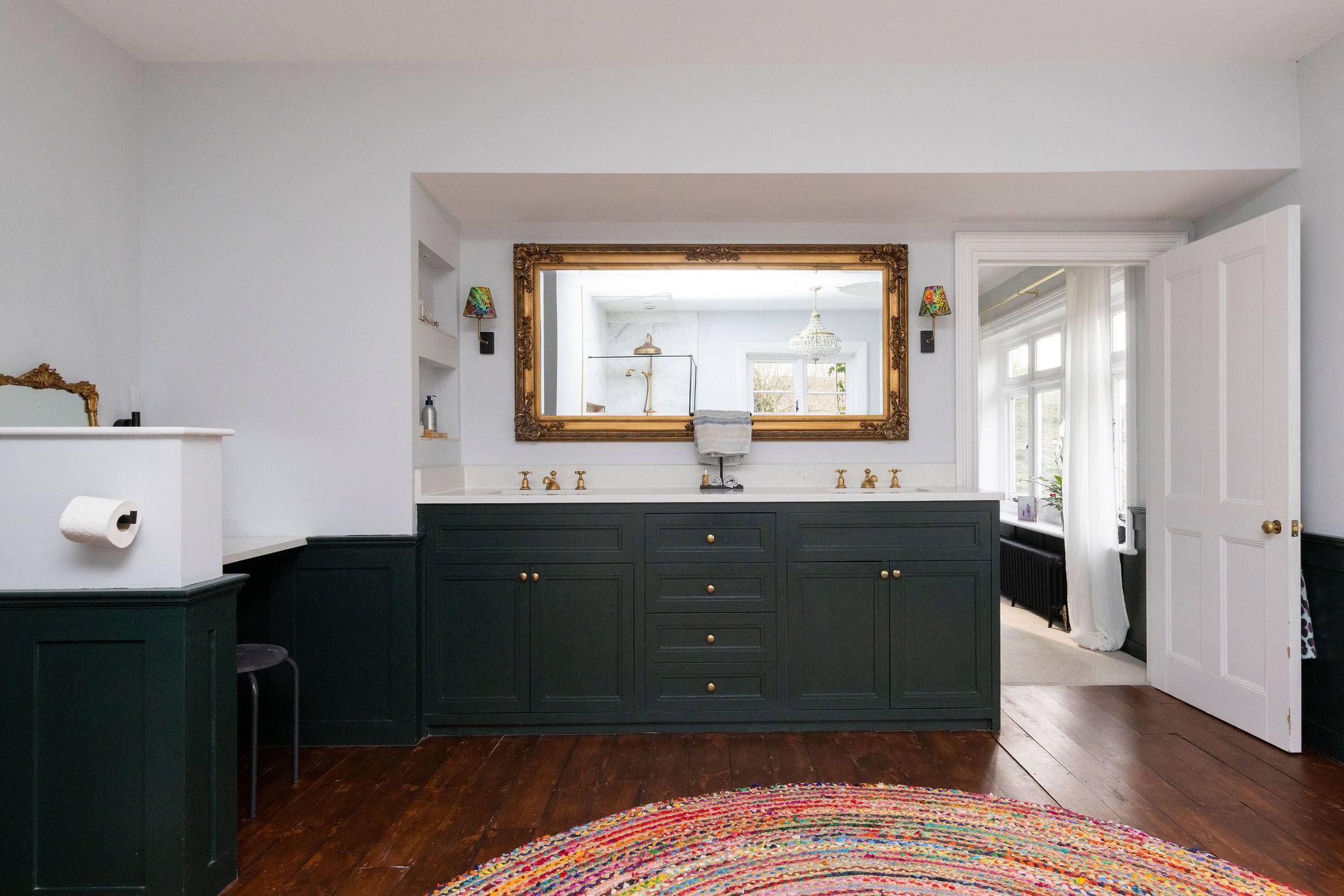 A vintage-inspired vanity with elegant gold details