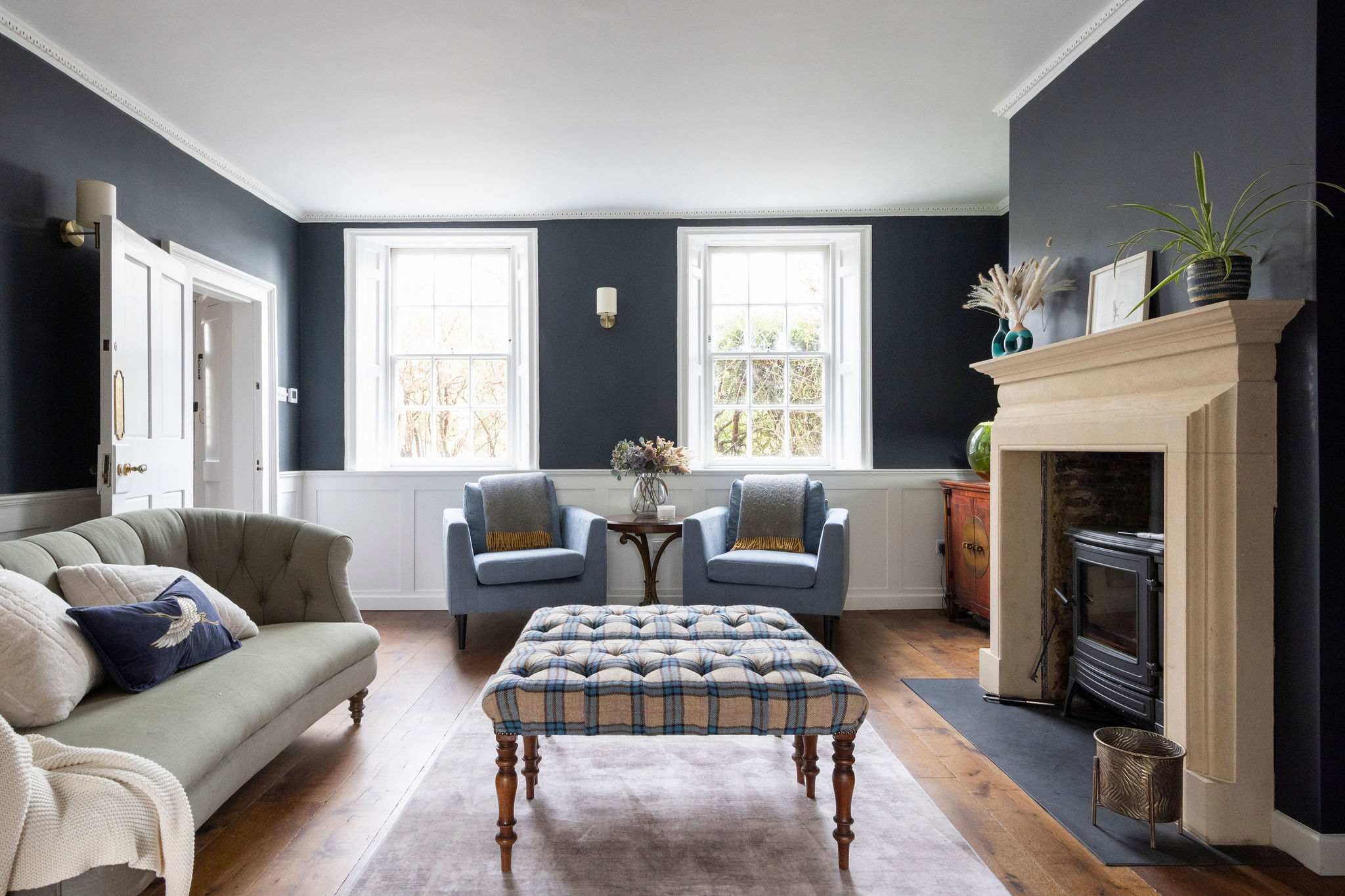 A classic sitting area with plush seating and natural light
