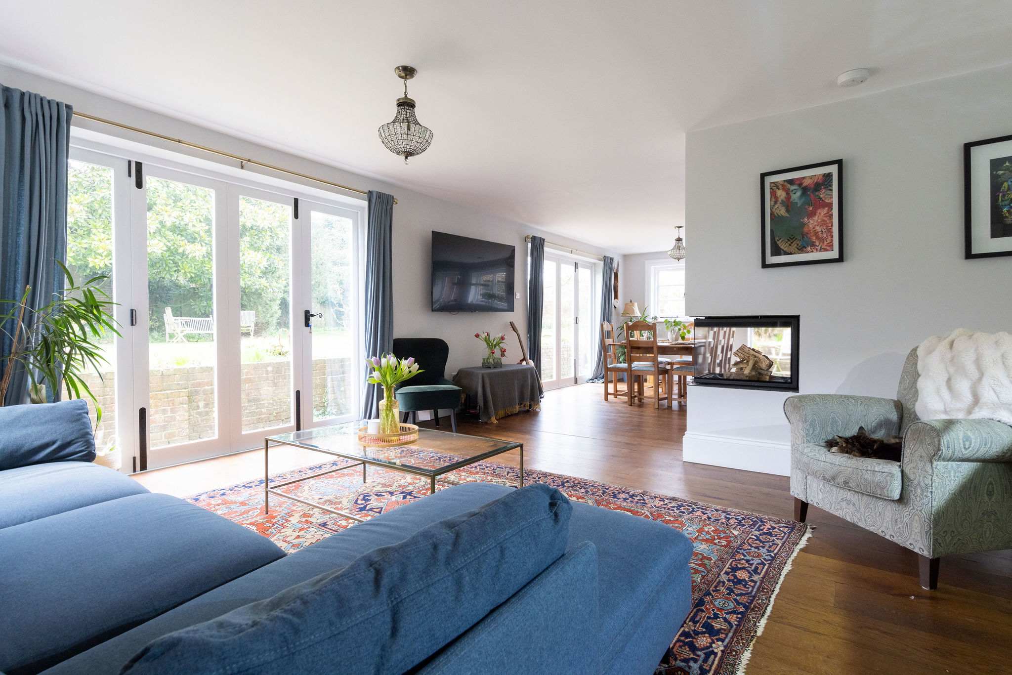 A bright and spacious open-plan living area with stunning garden views