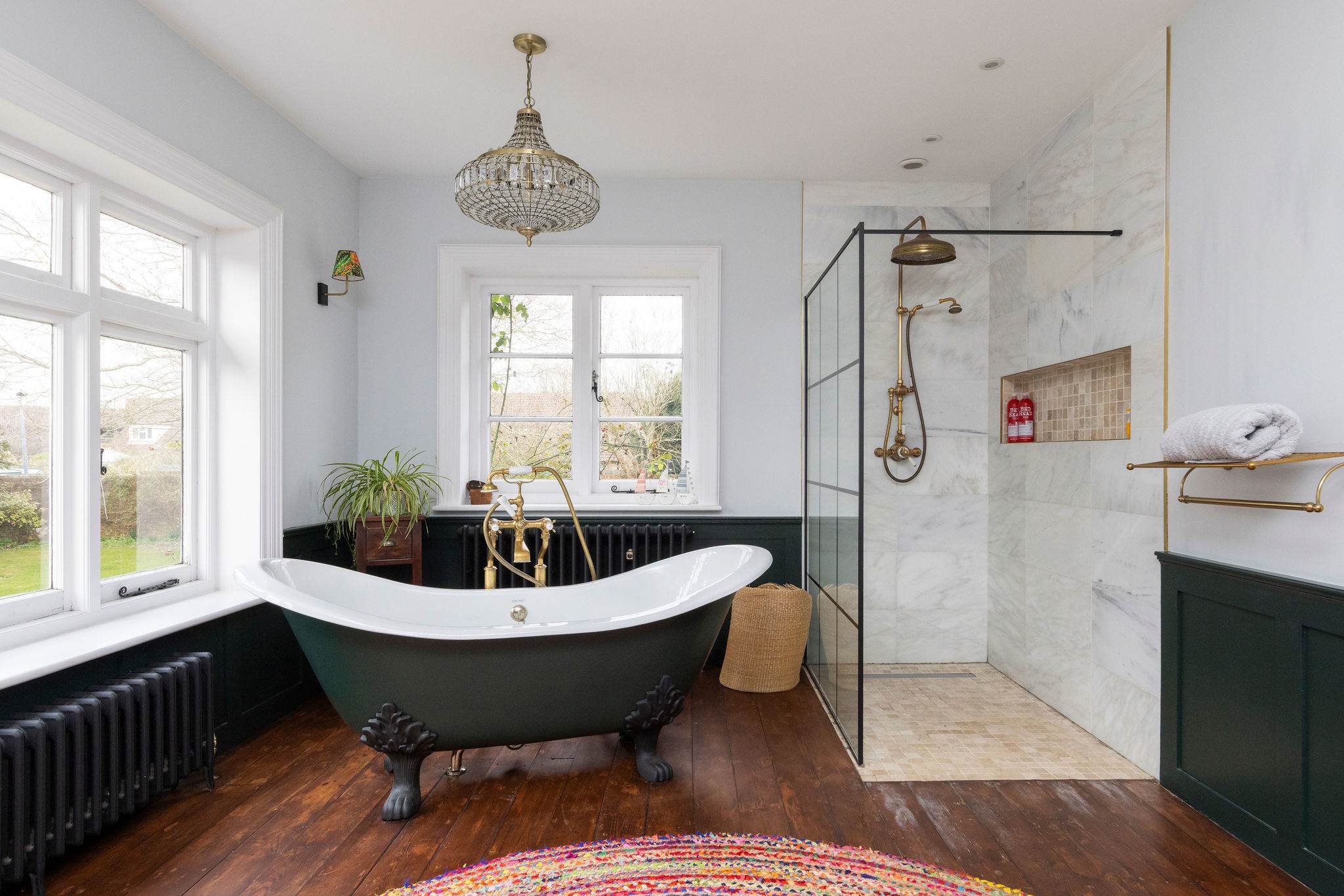 Luxurious bathroom retreat with a freestanding tub and vintage brass fittings