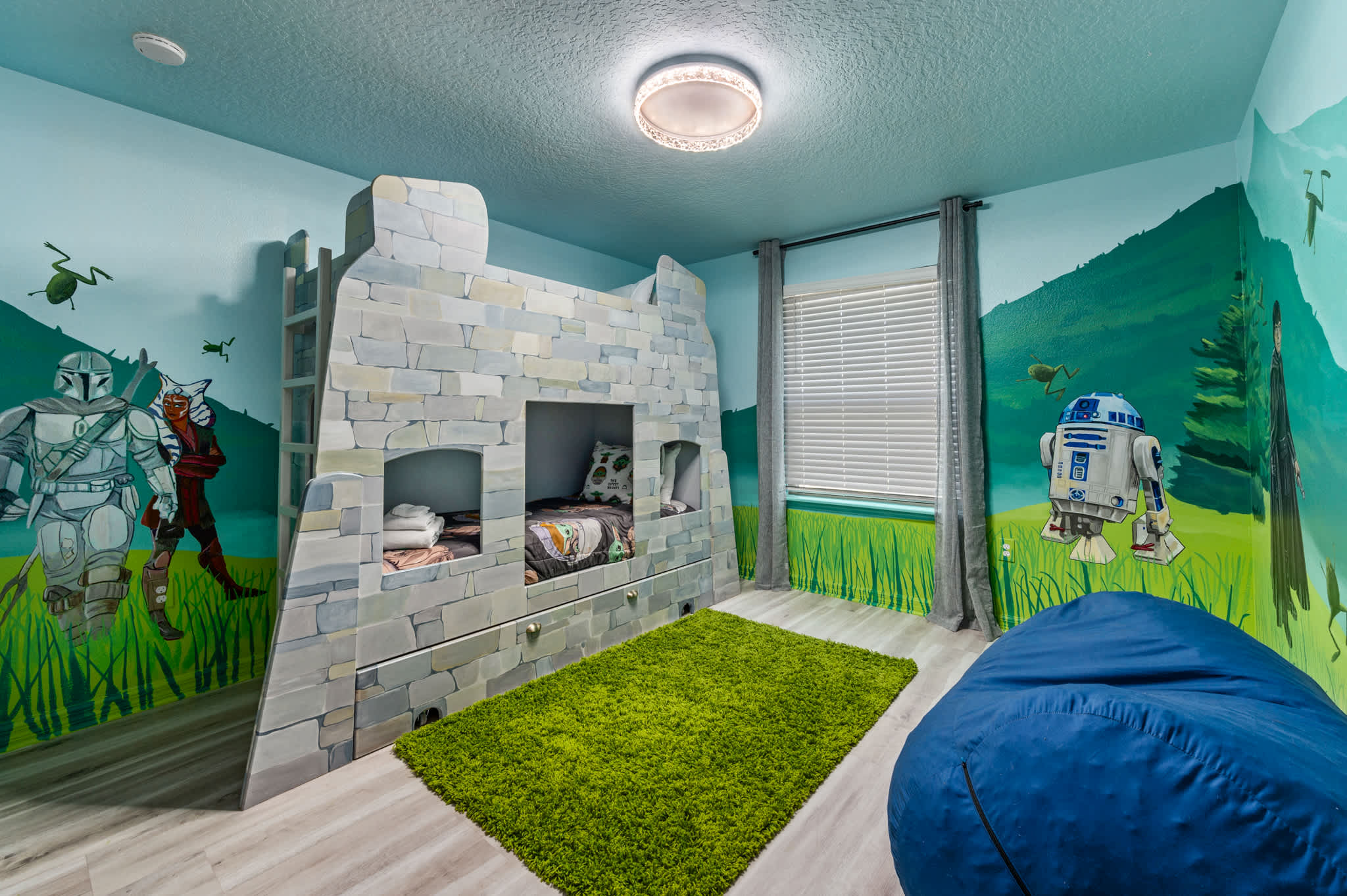 Let your young Padawans embark on galactic adventures in this amazing Star Wars themed bunk room! Perfect for creating unforgettable vacation memories.