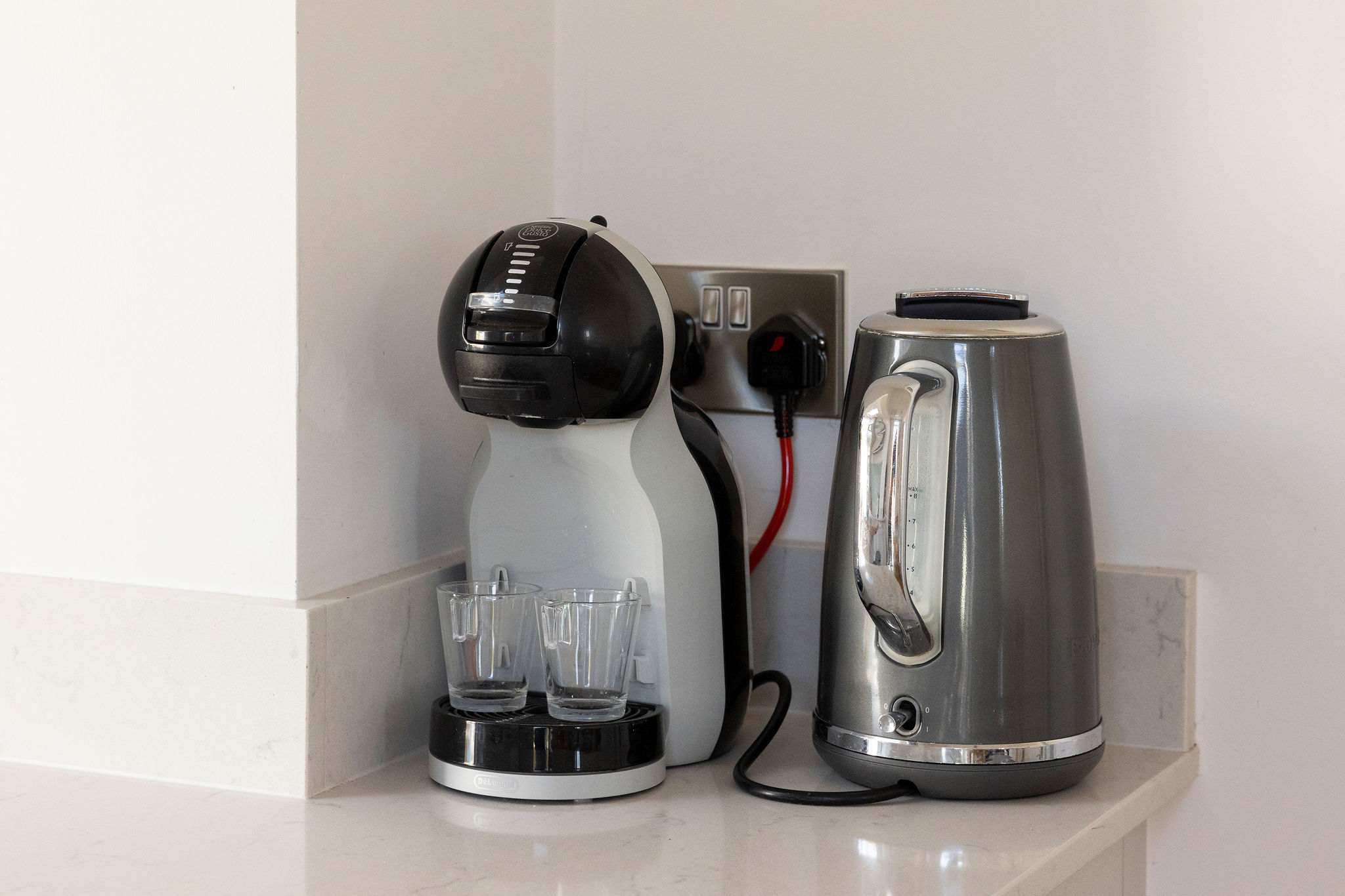 Tea or Coffee? This home offers a Nescafe Dolce Gusto coffee machine.