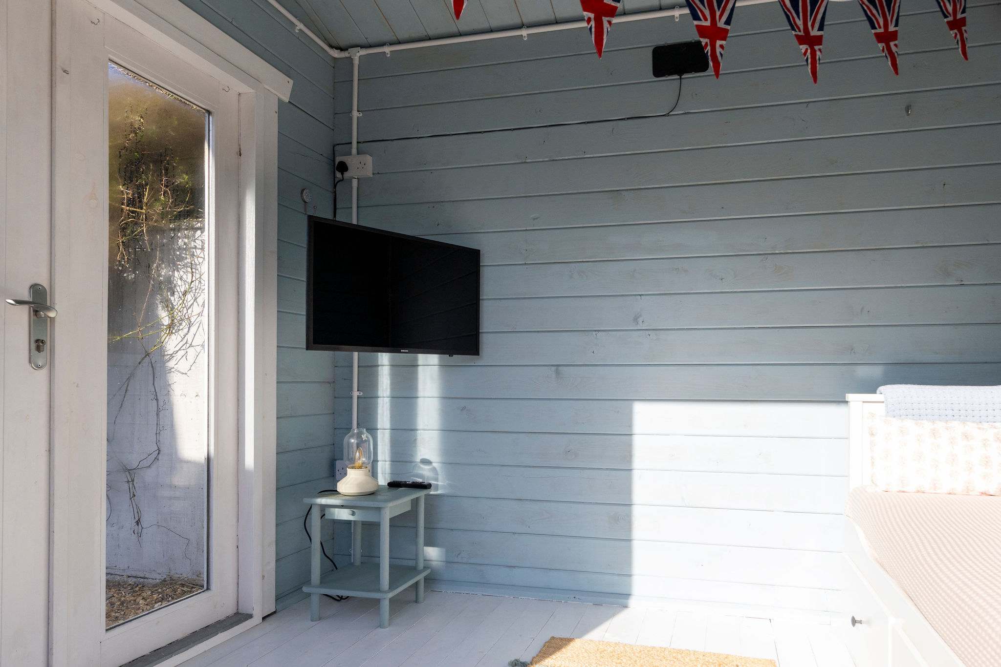 Outdoor TV for entertainment.