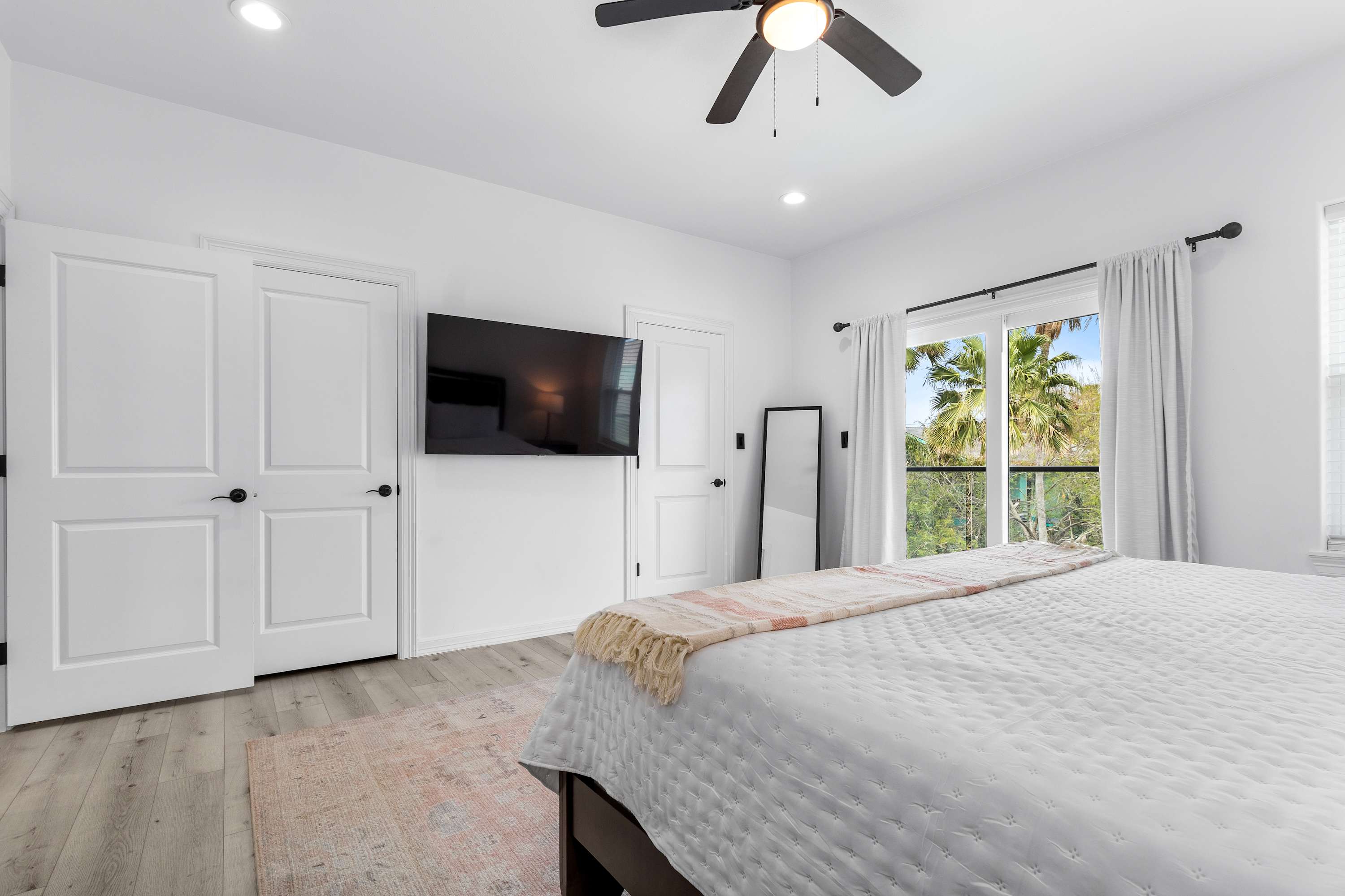 King bedroom with smart TV