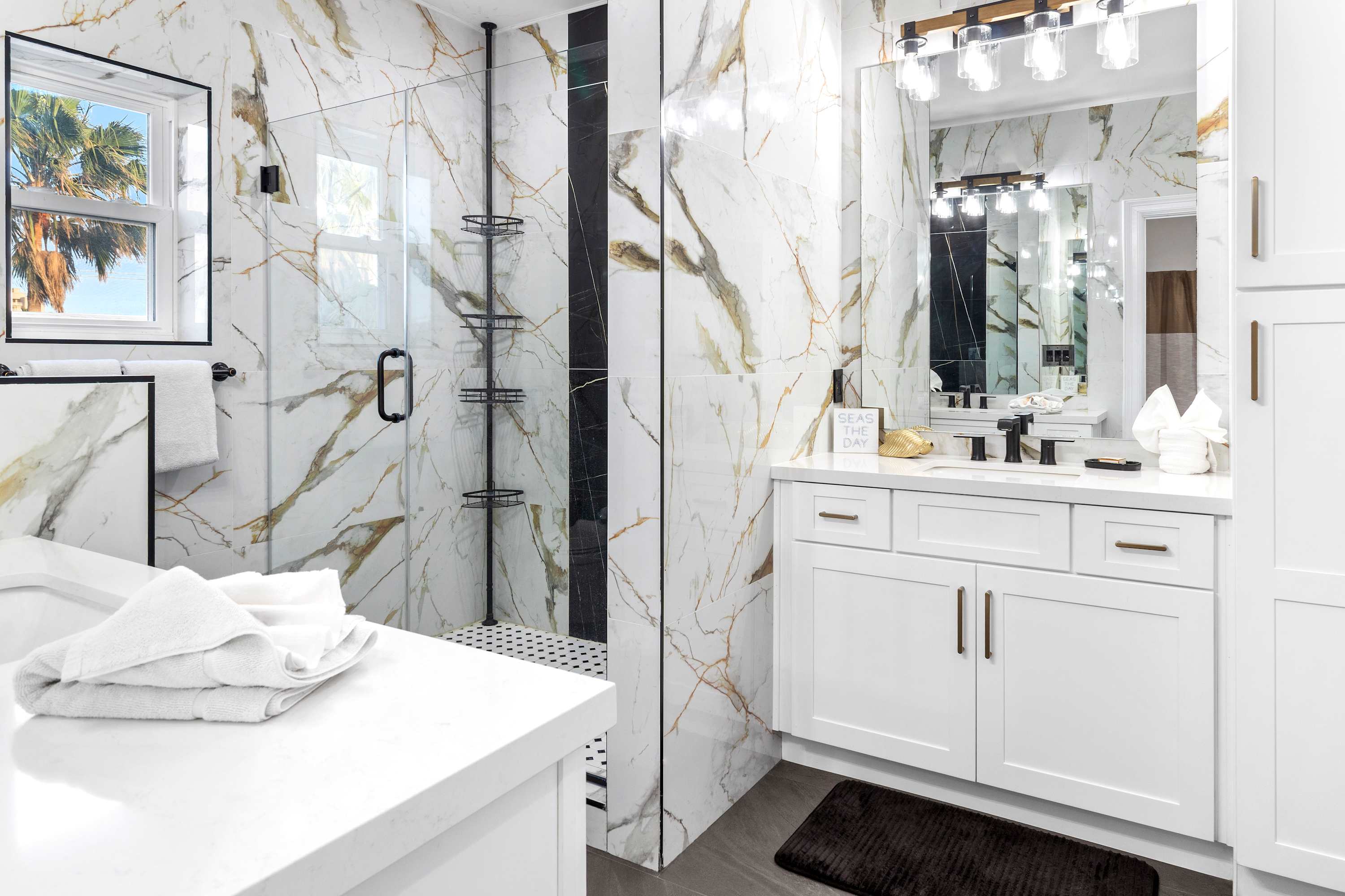 Full en-suite bathroom with standing shower