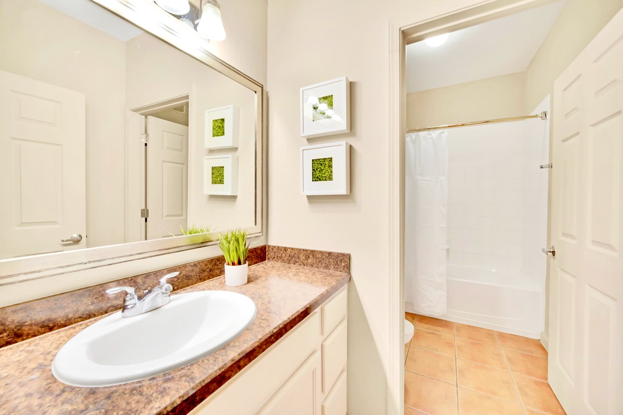 Full bathroom with integrated bathtub and shower