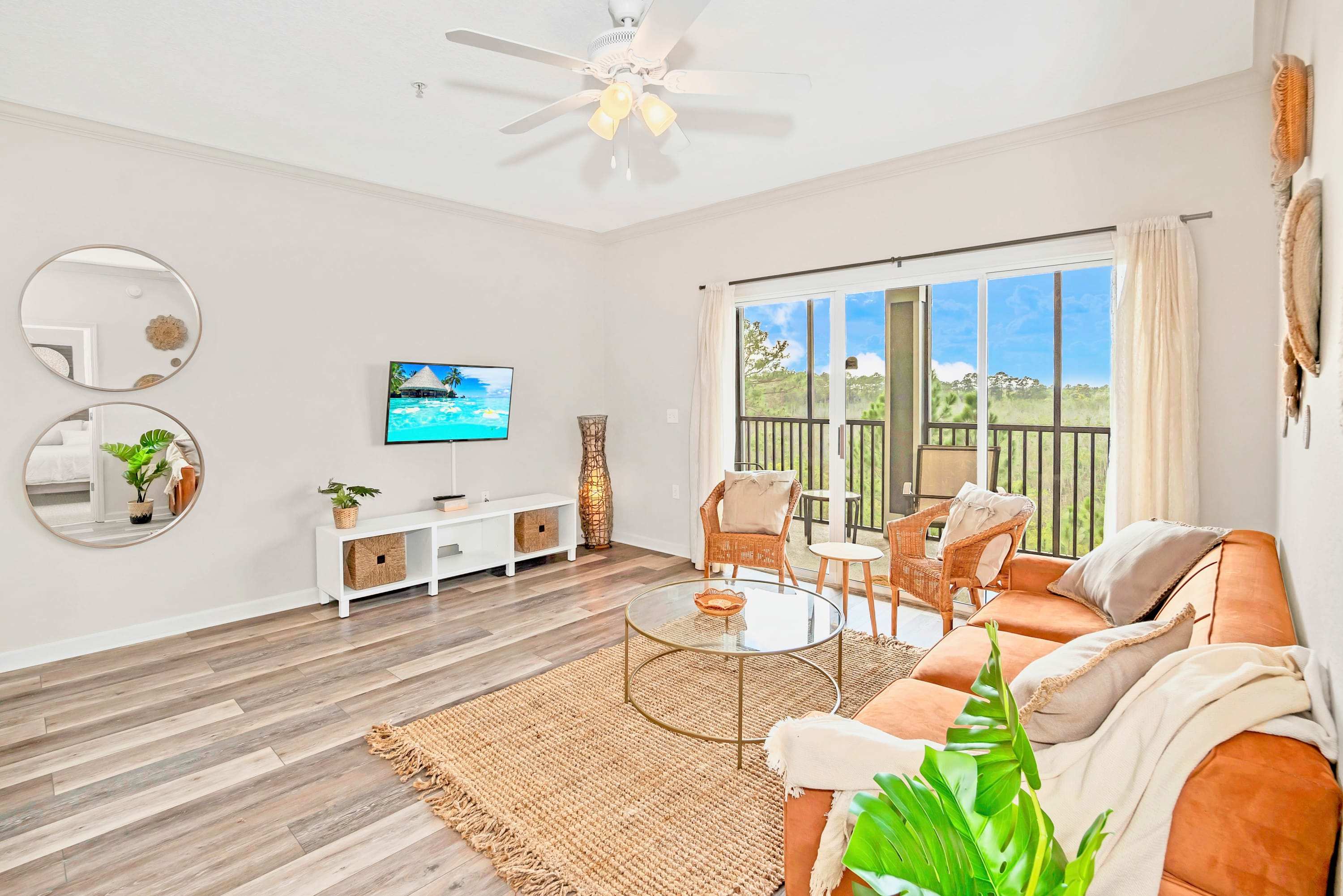 Modern living area with direct patio access and smart TV