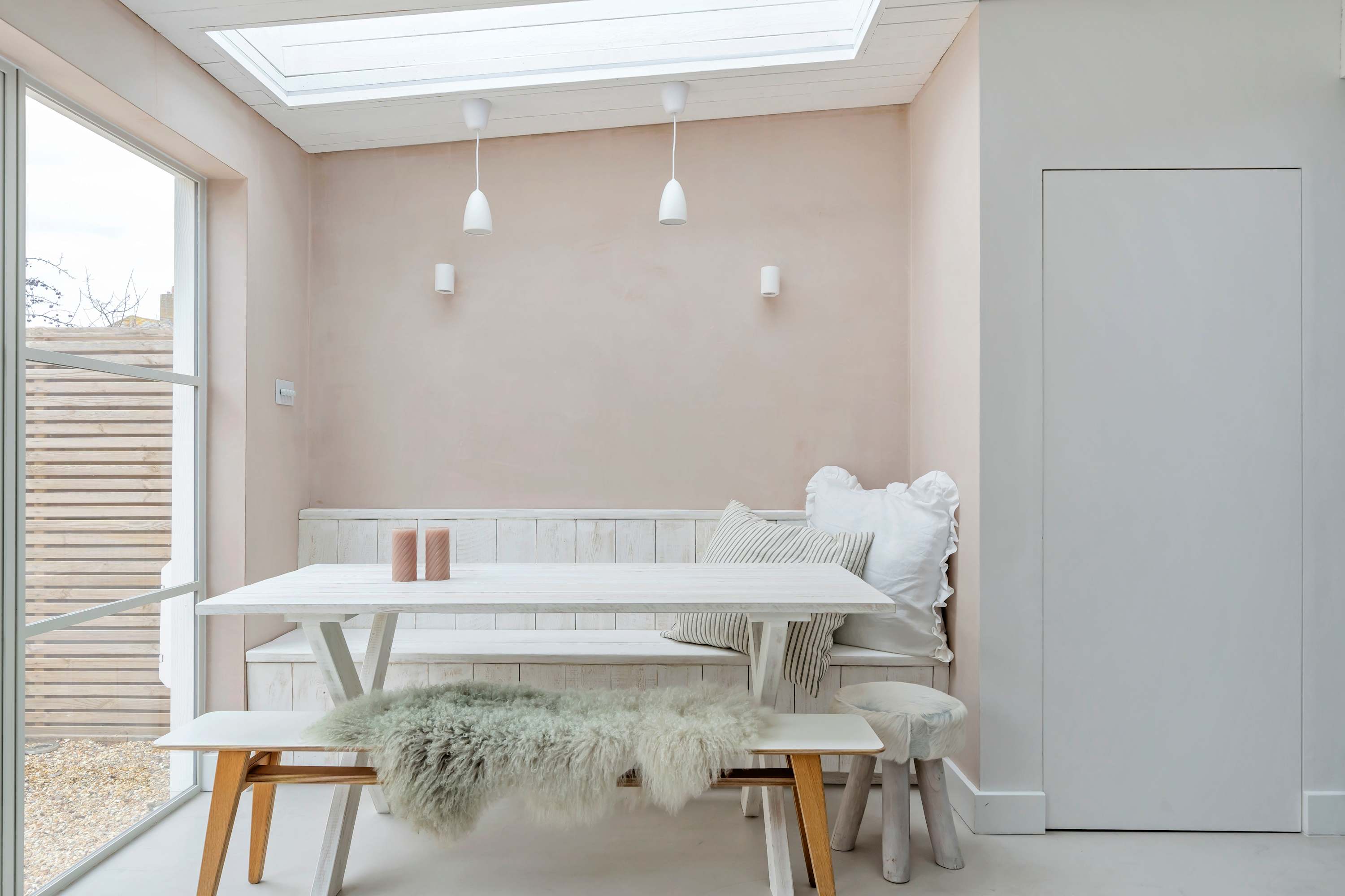 Share meals and moments under the skylight in this bright, Scandinavian-style dining nook.