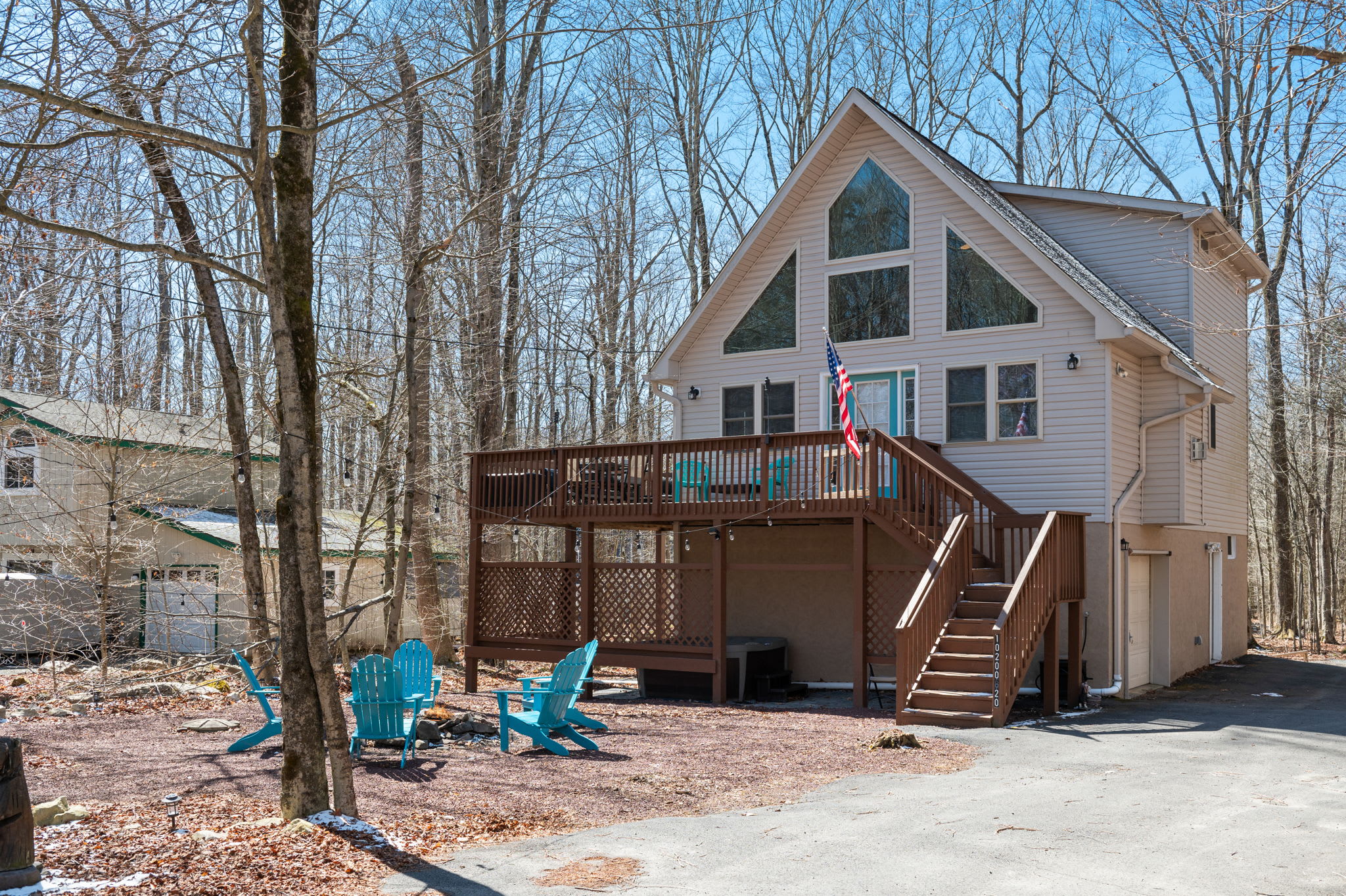Escape to this charming A-frame chalet nestled in the wooded Poconos.
