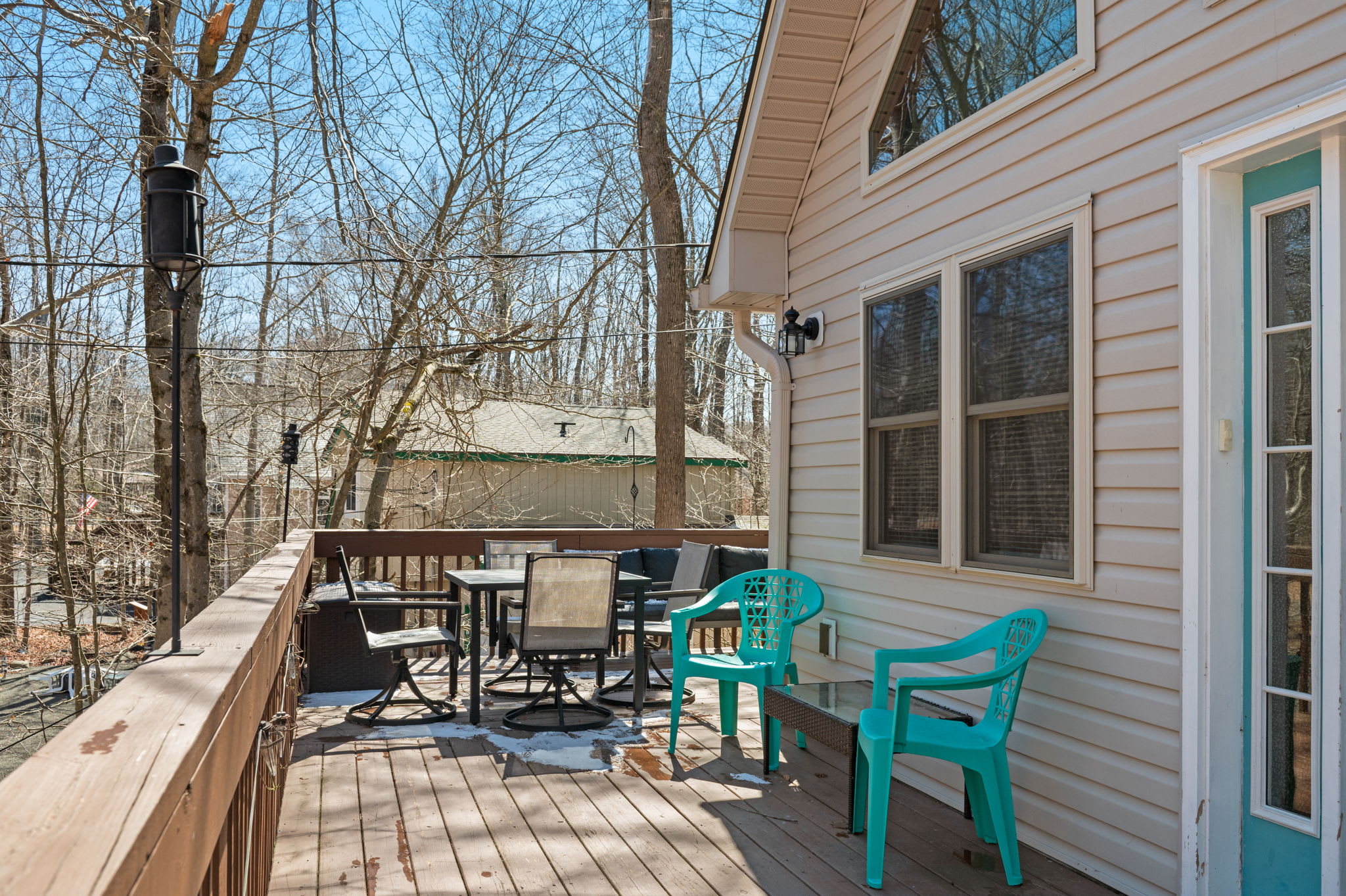 Step outside to the deck for outdoor dining and relaxation among the trees.