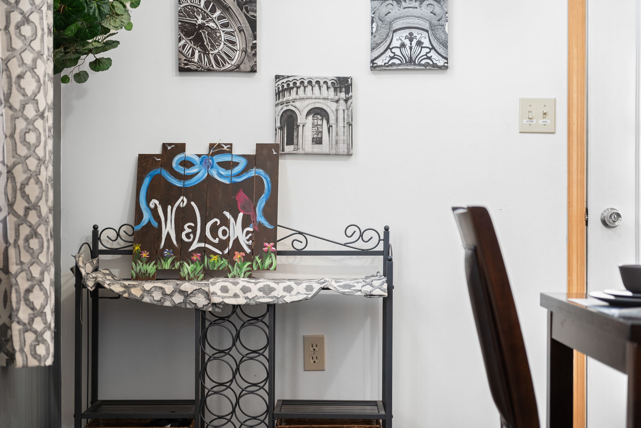 A warm welcome awaits at the charming entryway with rustic touches.