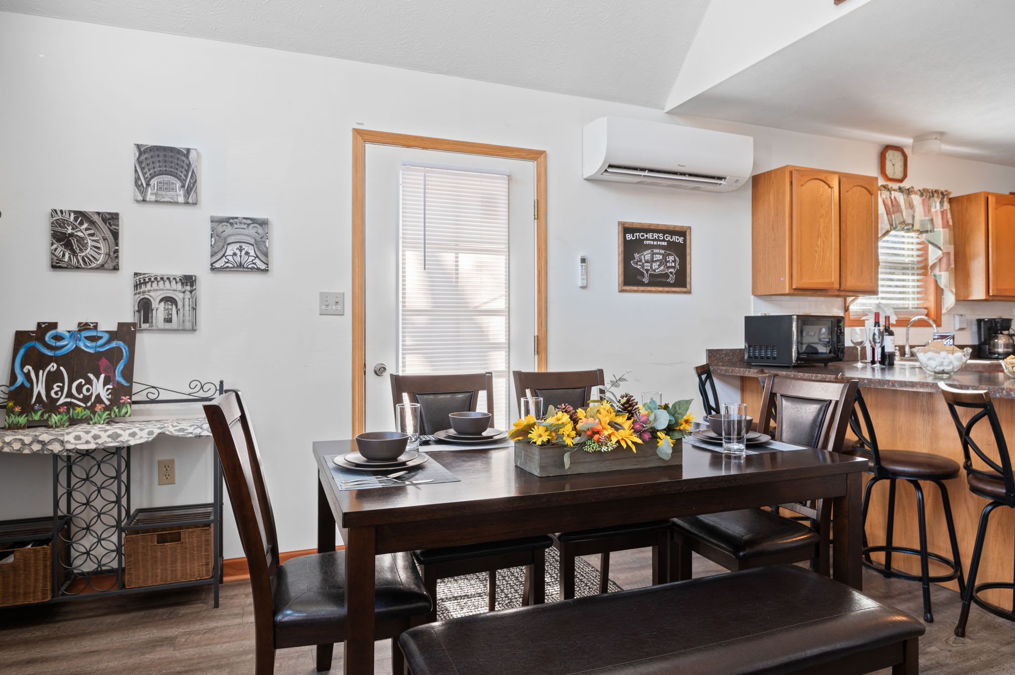 Gather in the open-concept living and dining area with soaring A-frame ceilings